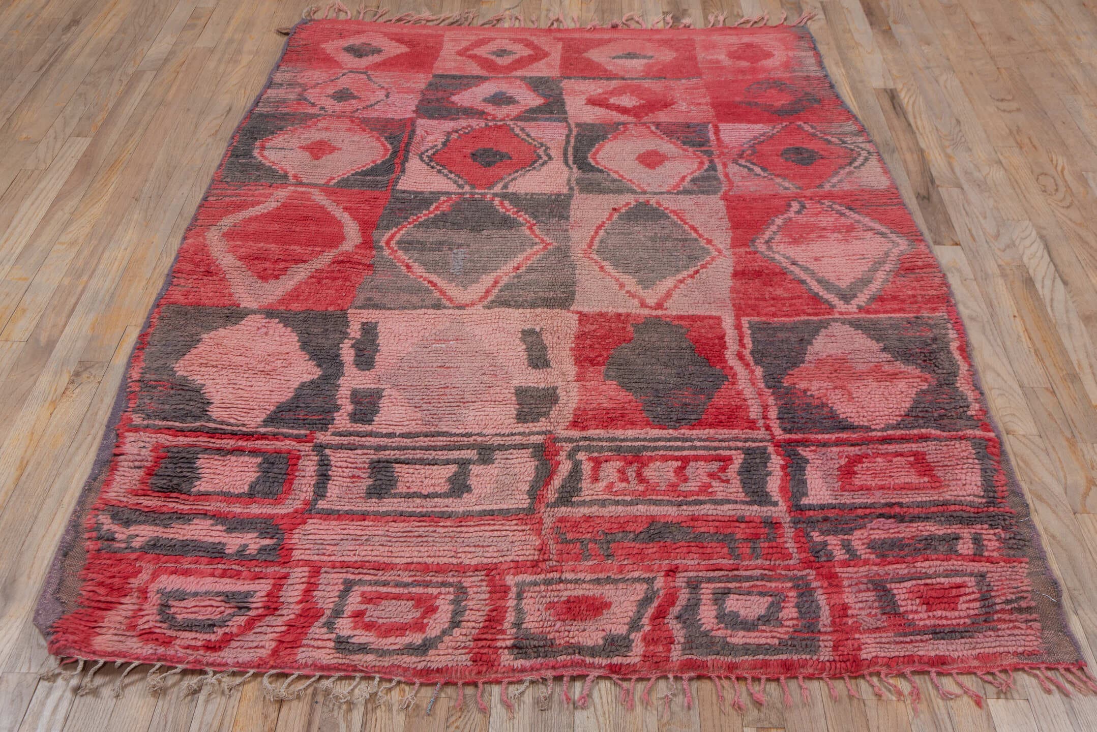 5' x 6' one-of-a-kind handmade vintage Moroccan rug. Color palette: rose, crimson, charcoal, blush, terra cotta, pink, red