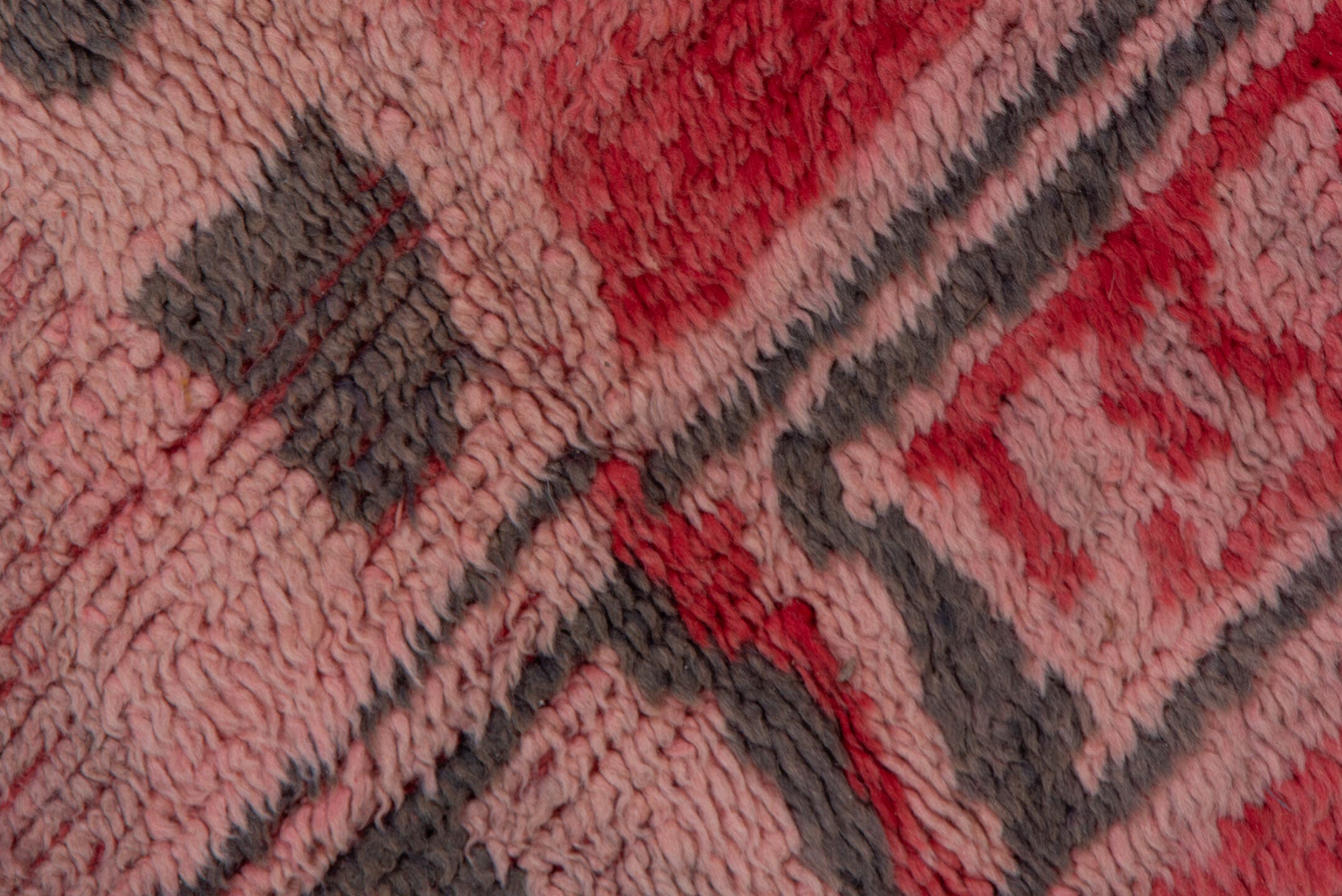 5' x 6' one-of-a-kind handmade vintage Moroccan rug. Color palette: rose, crimson, charcoal, blush, terra cotta, pink, red