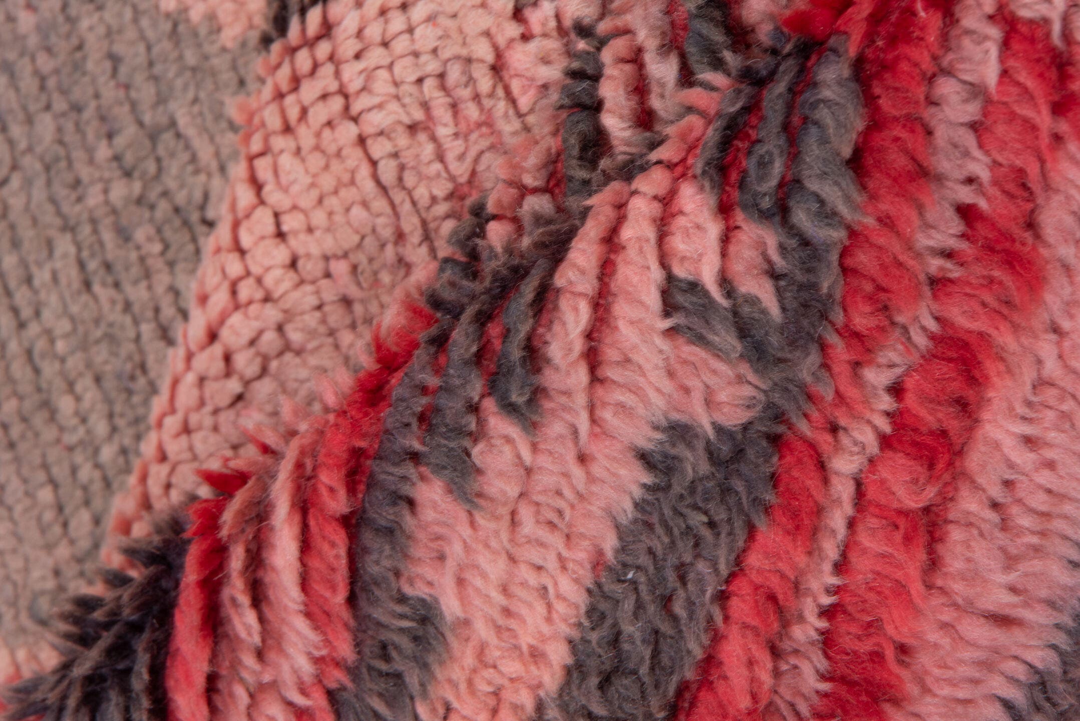 5' x 6' one-of-a-kind handmade vintage Moroccan rug. Color palette: rose, crimson, charcoal, blush, terra cotta, pink, red