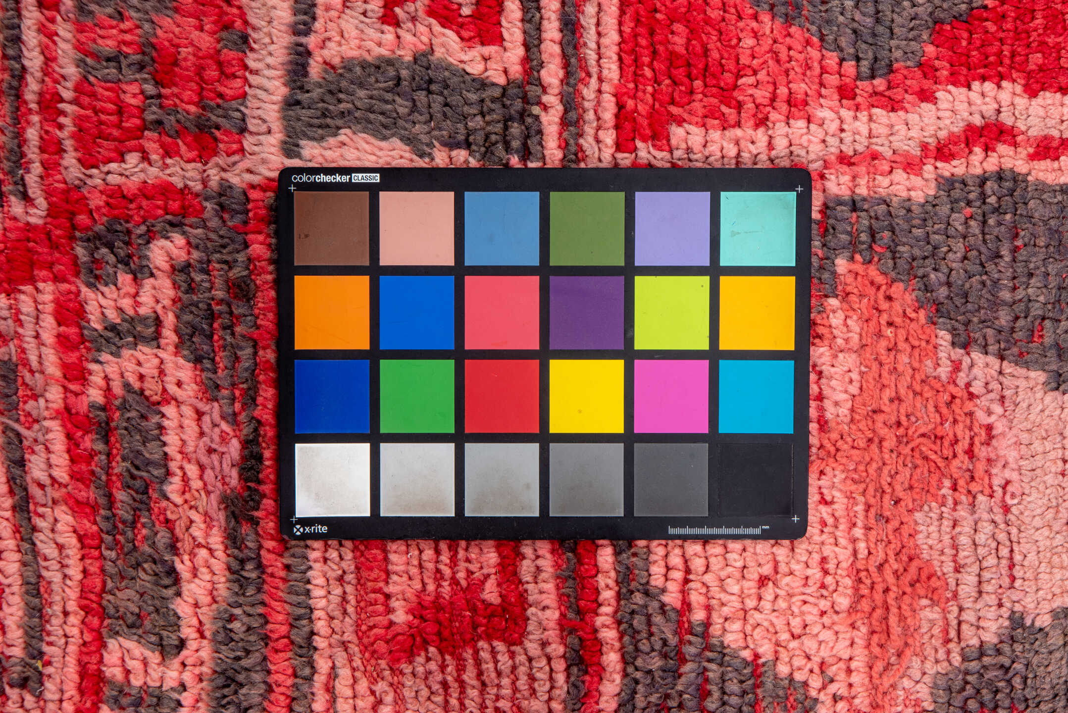 5' x 6' one-of-a-kind handmade vintage Moroccan rug. Color palette: brown, gray, indian red, pink, red, wine