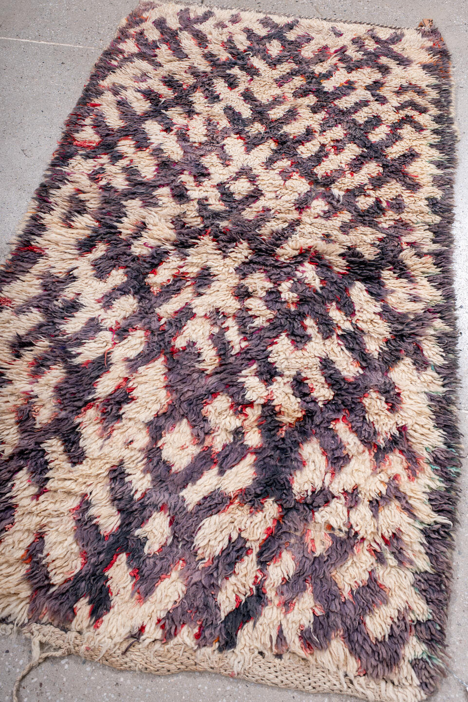 3' x 5' one-of-a-kind handmade vintage Moroccan small size rug. Color palette: ivory, plum, charcoal, crimson, rose, pink