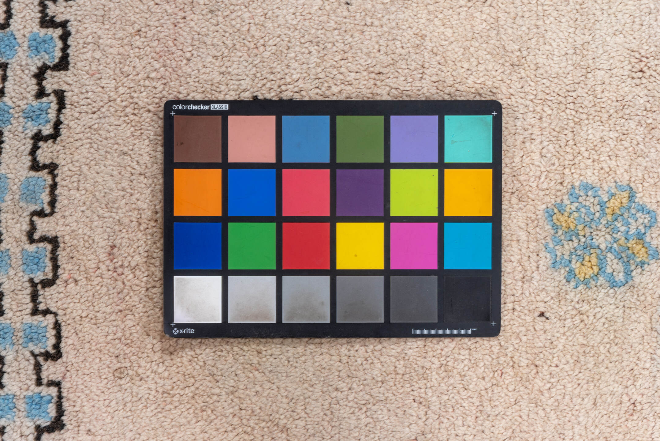 5' x 6' one-of-a-kind handmade vintage Moroccan rug. Color palette: blue, brown, dark gray, gray, light gray