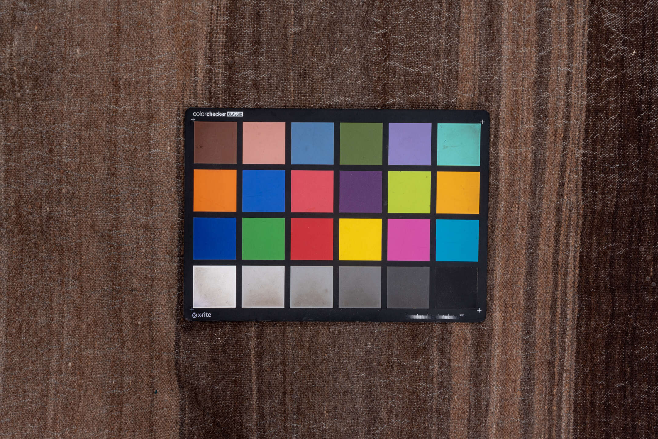 4' x 6' one-of-a-kind handmade vintage Blanket small size rug. Color palette: brown, gray, light gray, off-white, pink