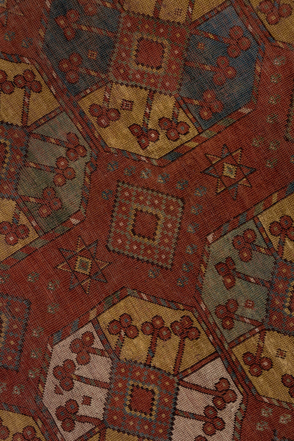 7' x 11' one-of-a-kind handmade antique Afghan large size rug. Color palette: rust, terra cotta, camel, ivory, slate blue