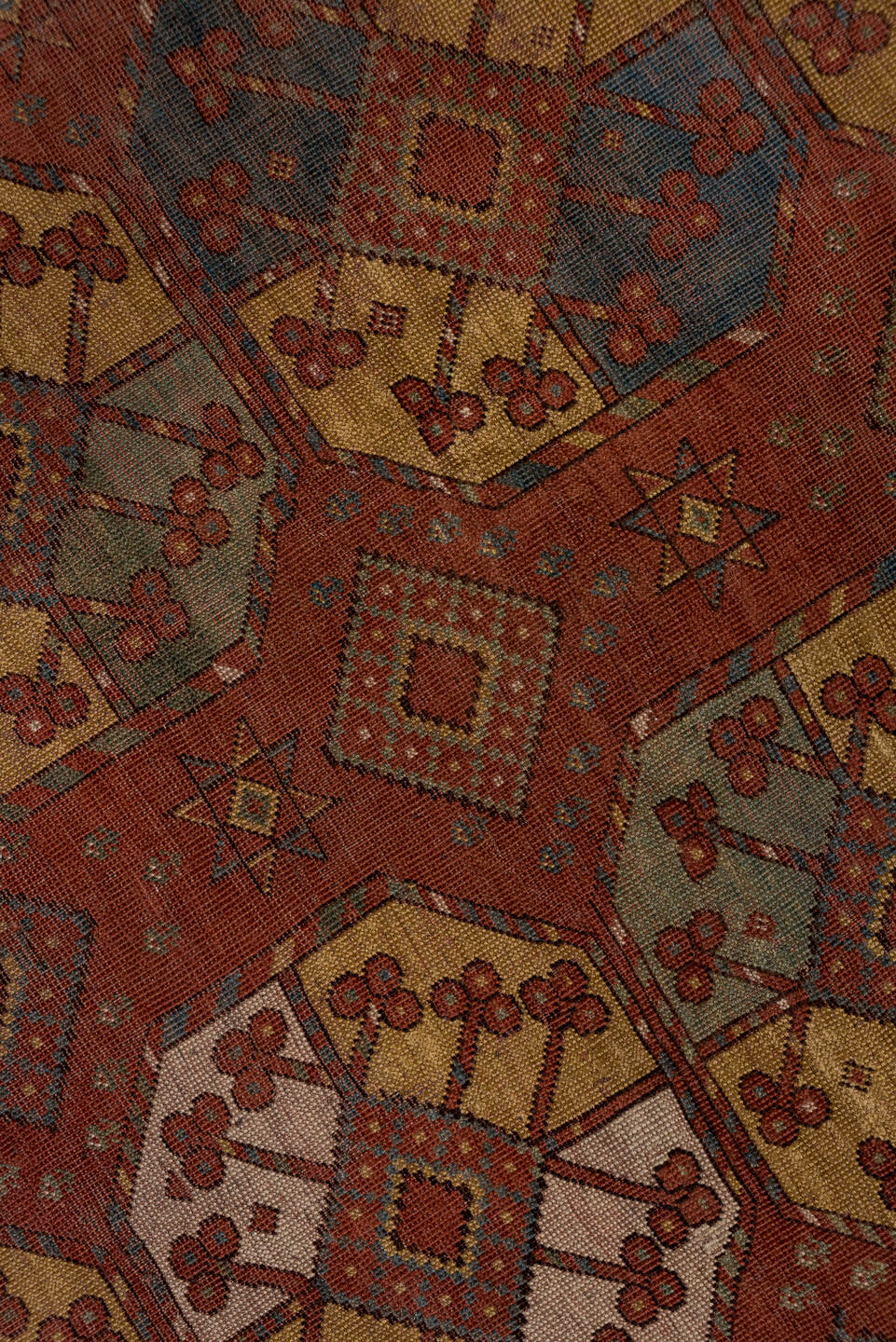 7' x 11' one-of-a-kind handmade antique Afghan large size rug. Color palette: rust, terra cotta, camel, ivory, slate blue