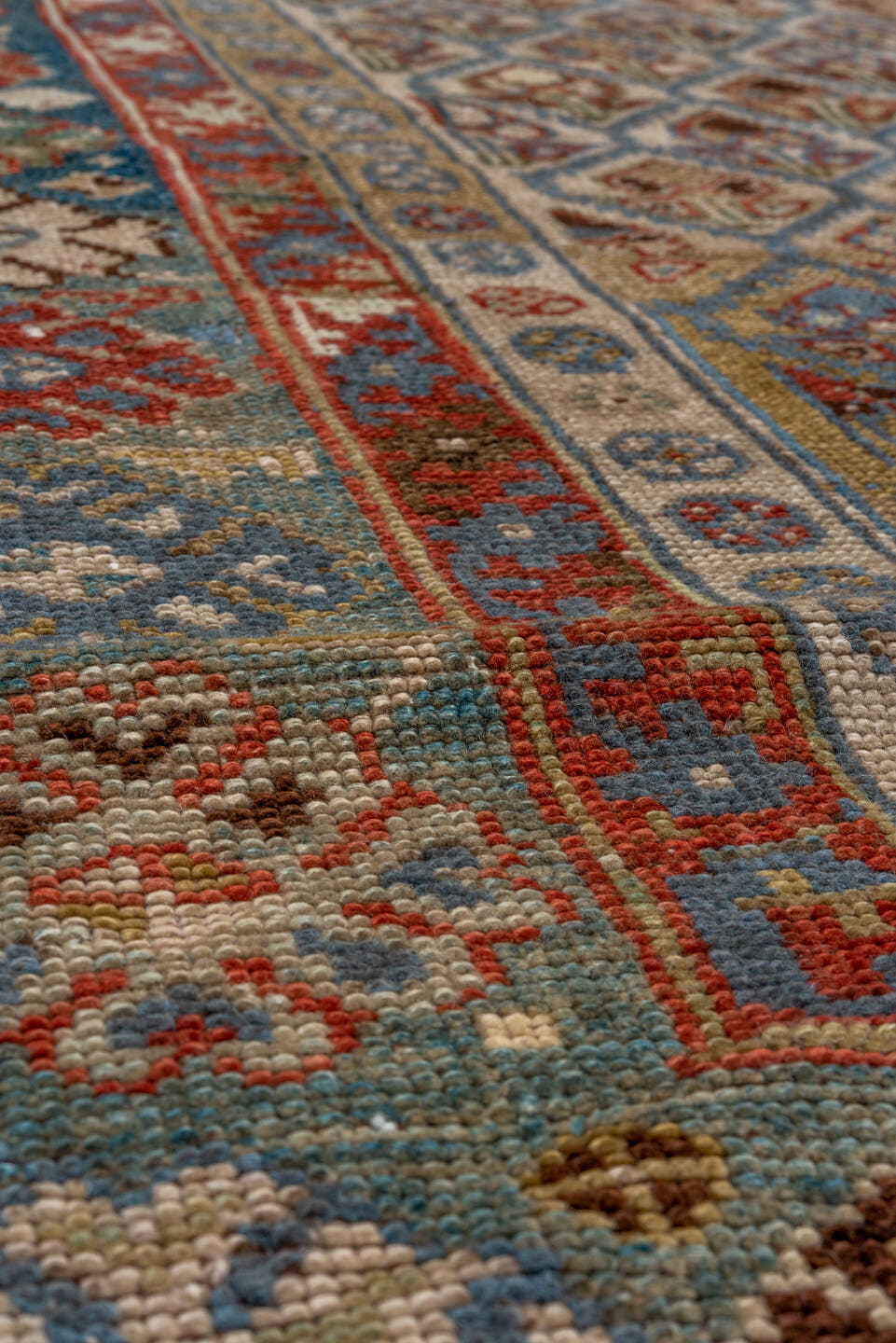 5' x 12' one-of-a-kind handmade antique NW Persian rug. Color palette: camel, ivory, slate, rust, blue, taupe, charcoal