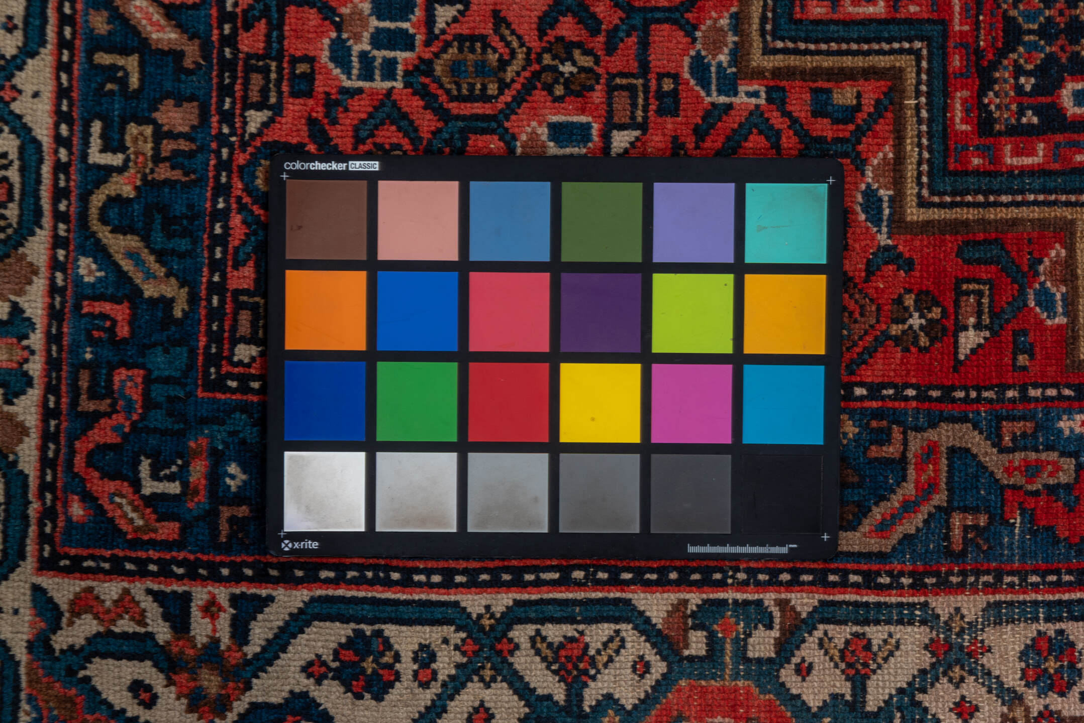 5' x 11' one-of-a-kind handmade vintage Malayer rug. Color palette: black, blue, brown, charcoal, gray, pink, red