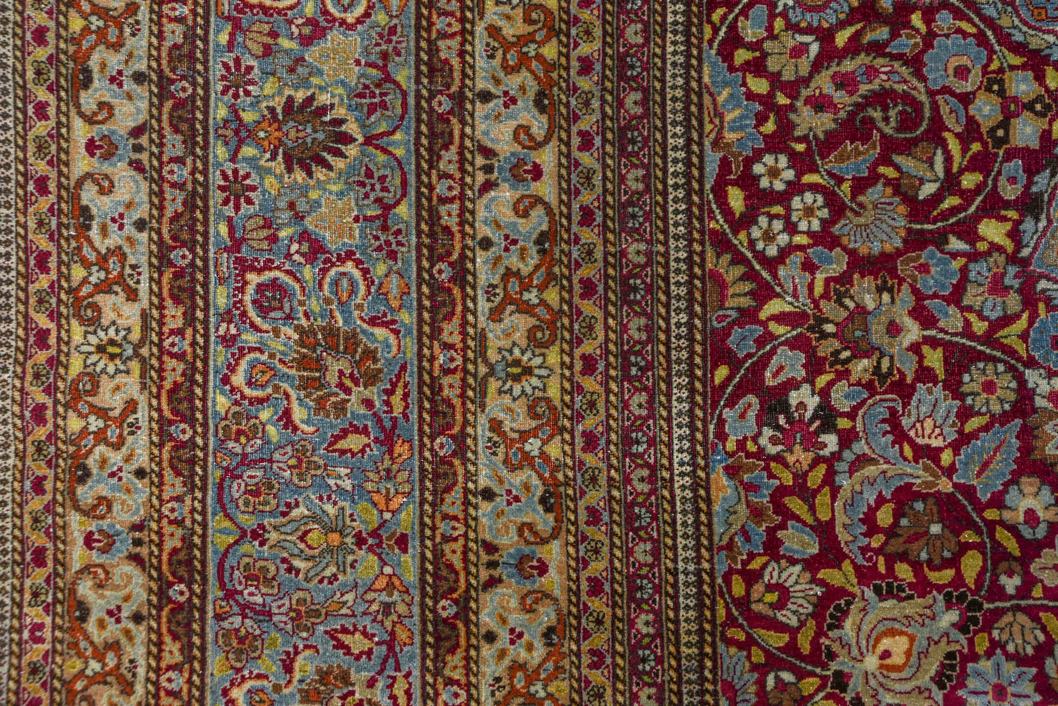 11' x 17' one-of-a-kind handmade antique Kerman oversize rug. Color palette: burgundy, sky blue, ivory, gold, rose, camel