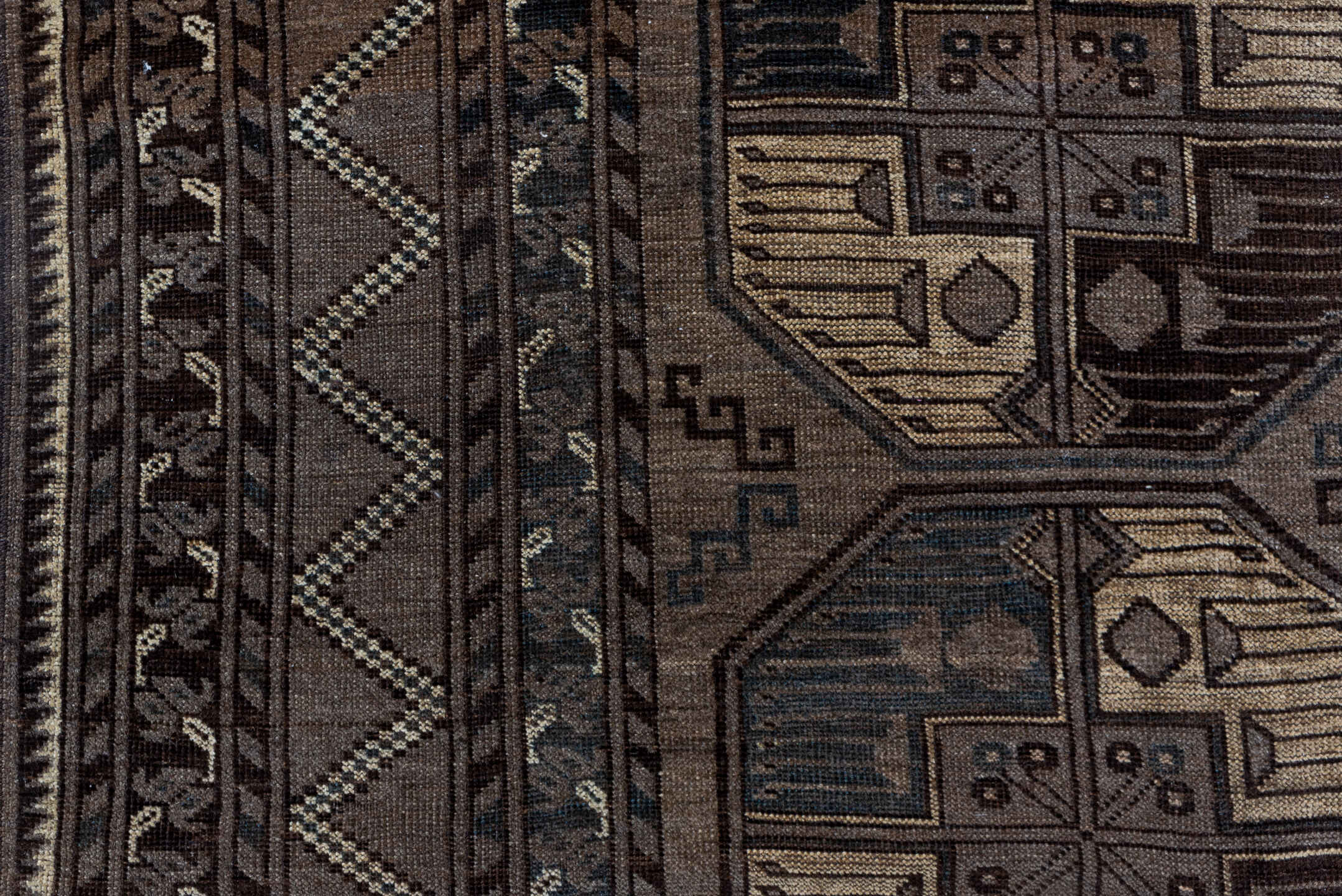7' x 10' one-of-a-kind handmade vintage Afghan large size rug. Color palette: black, brown, gray, light gray, off-white