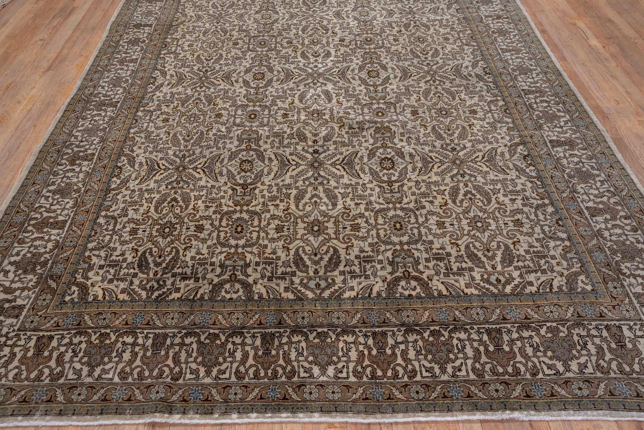 7' x 11' one-of-a-kind handmade antique Tabriz large size rug. Color palette: ivory, taupe, brown, camel, slate, soft_blue