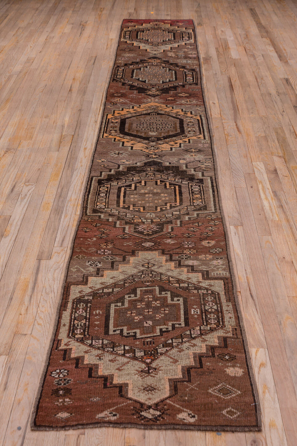 2' x 14' one-of-a-kind handmade antique Kars runner rug. Color palette: brown, taupe, rust, charcoal, camel, ivory