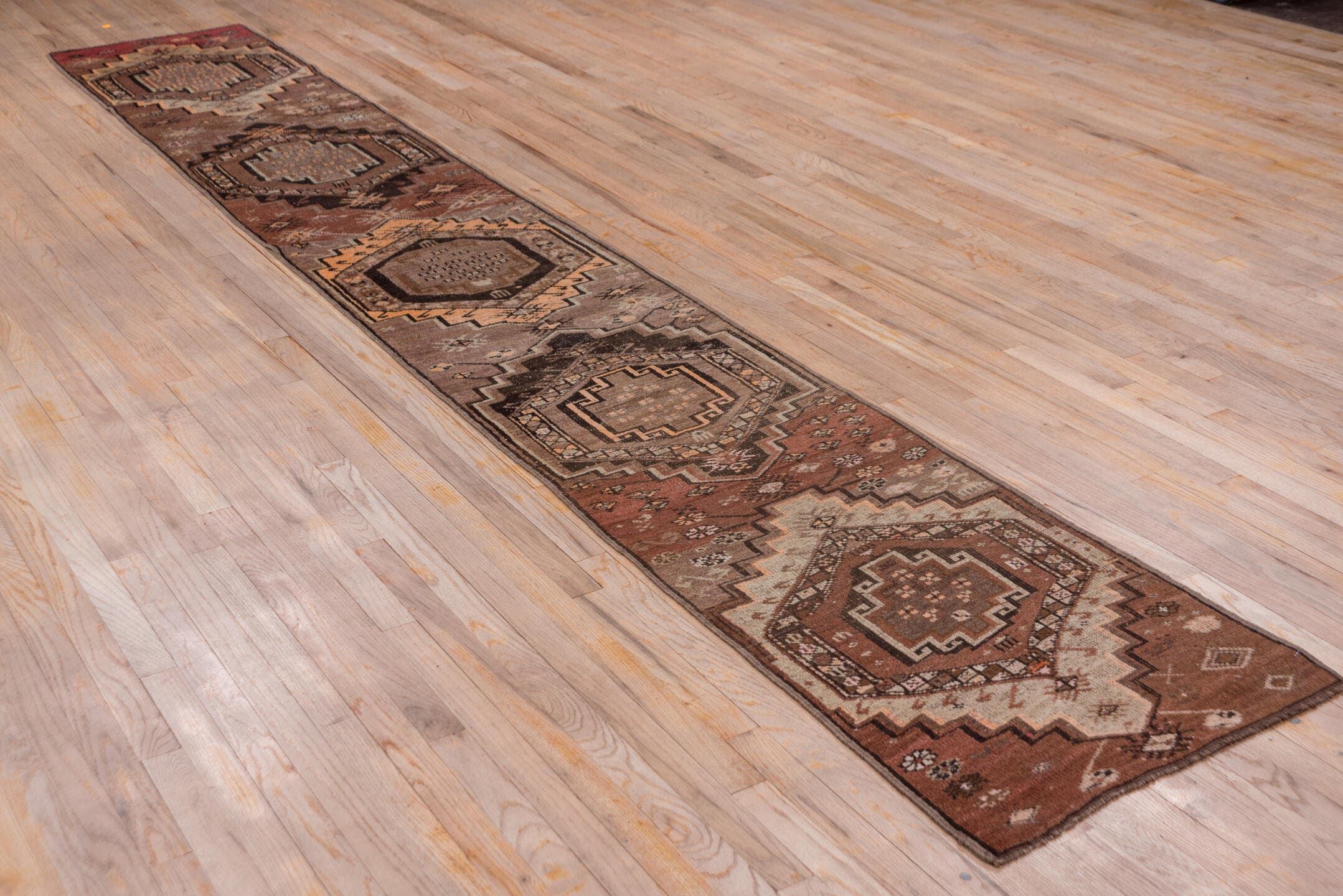2' x 14' one-of-a-kind handmade antique Kars runner rug. Color palette: brown, taupe, rust, charcoal, camel, ivory