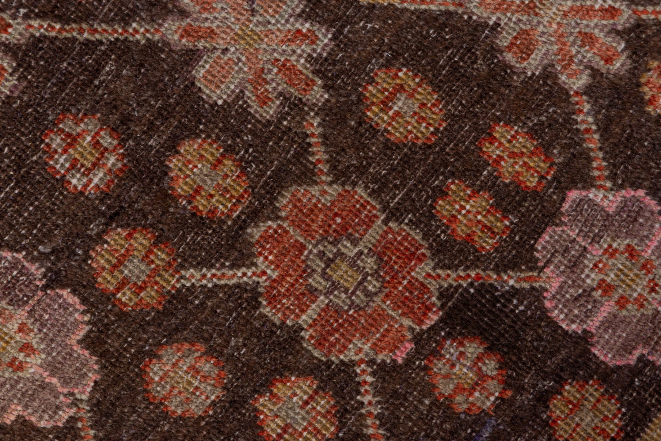 4' x 8' one-of-a-kind handmade vintage Khotan rug. Color palette: brown, pink, redwood