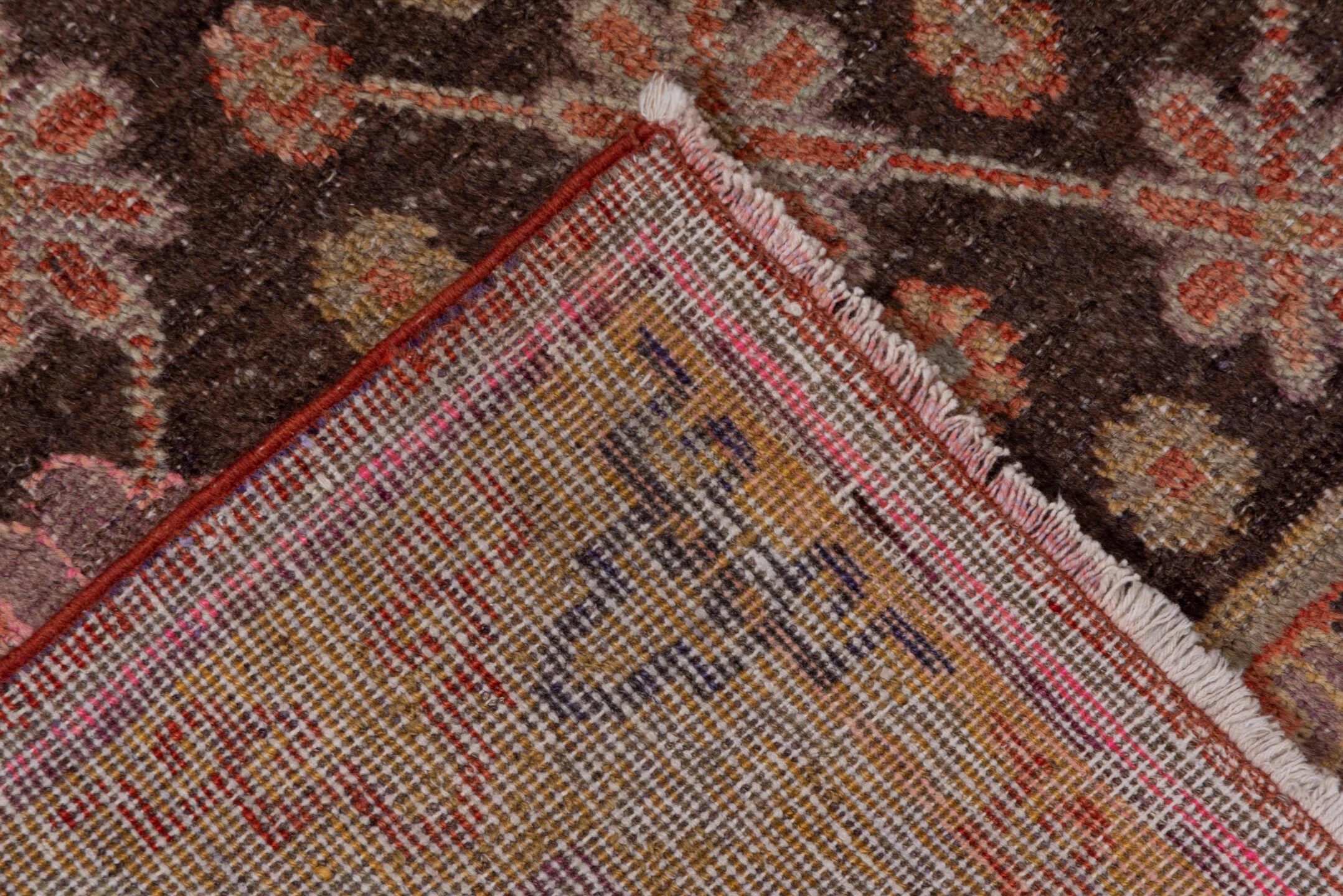 4' x 8' one-of-a-kind handmade vintage Khotan rug. Color palette: brown, rust, camel, ivory, rose, blue, charcoal