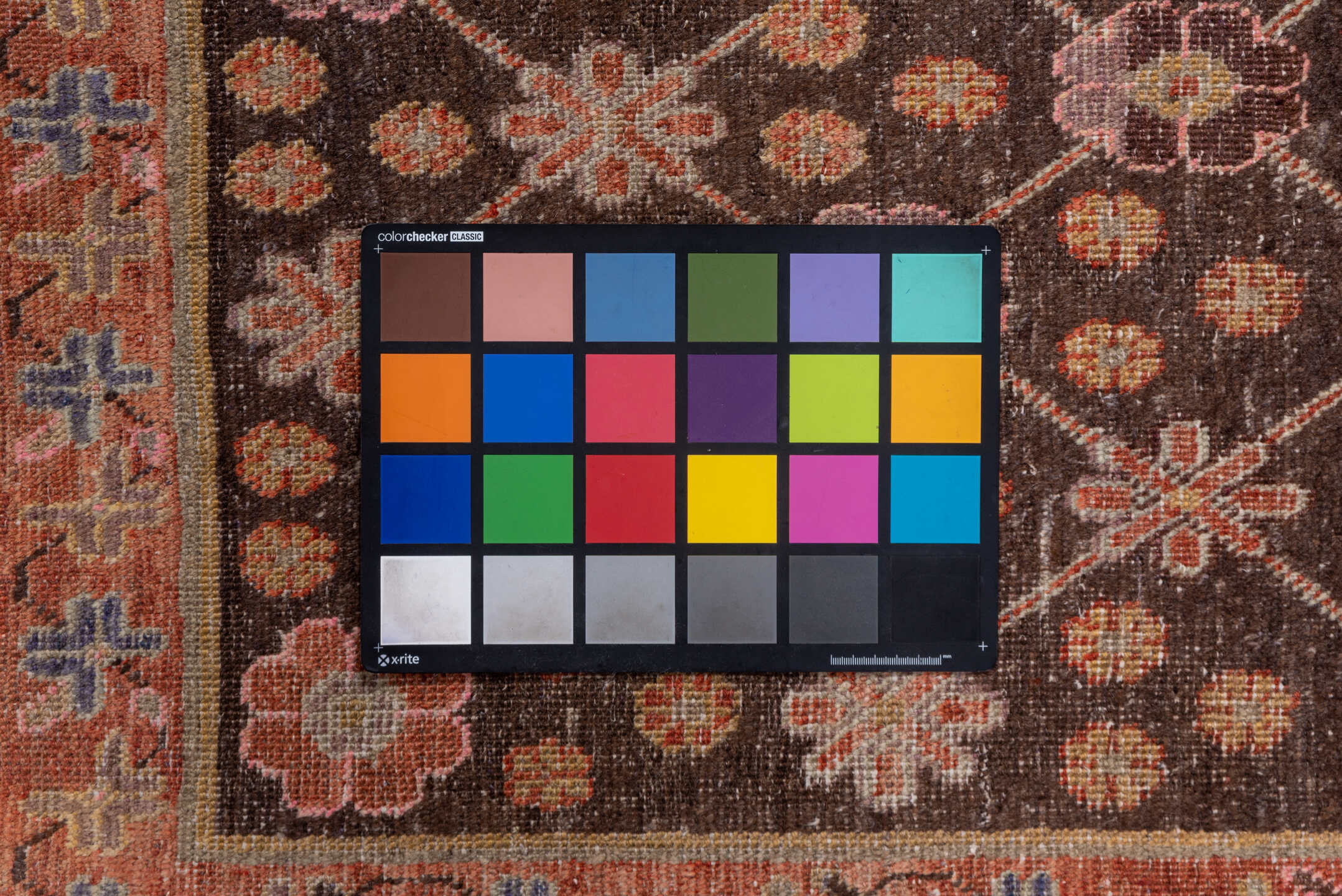 4' x 8' one-of-a-kind handmade vintage Khotan rug. Color palette: brown, pink, redwood