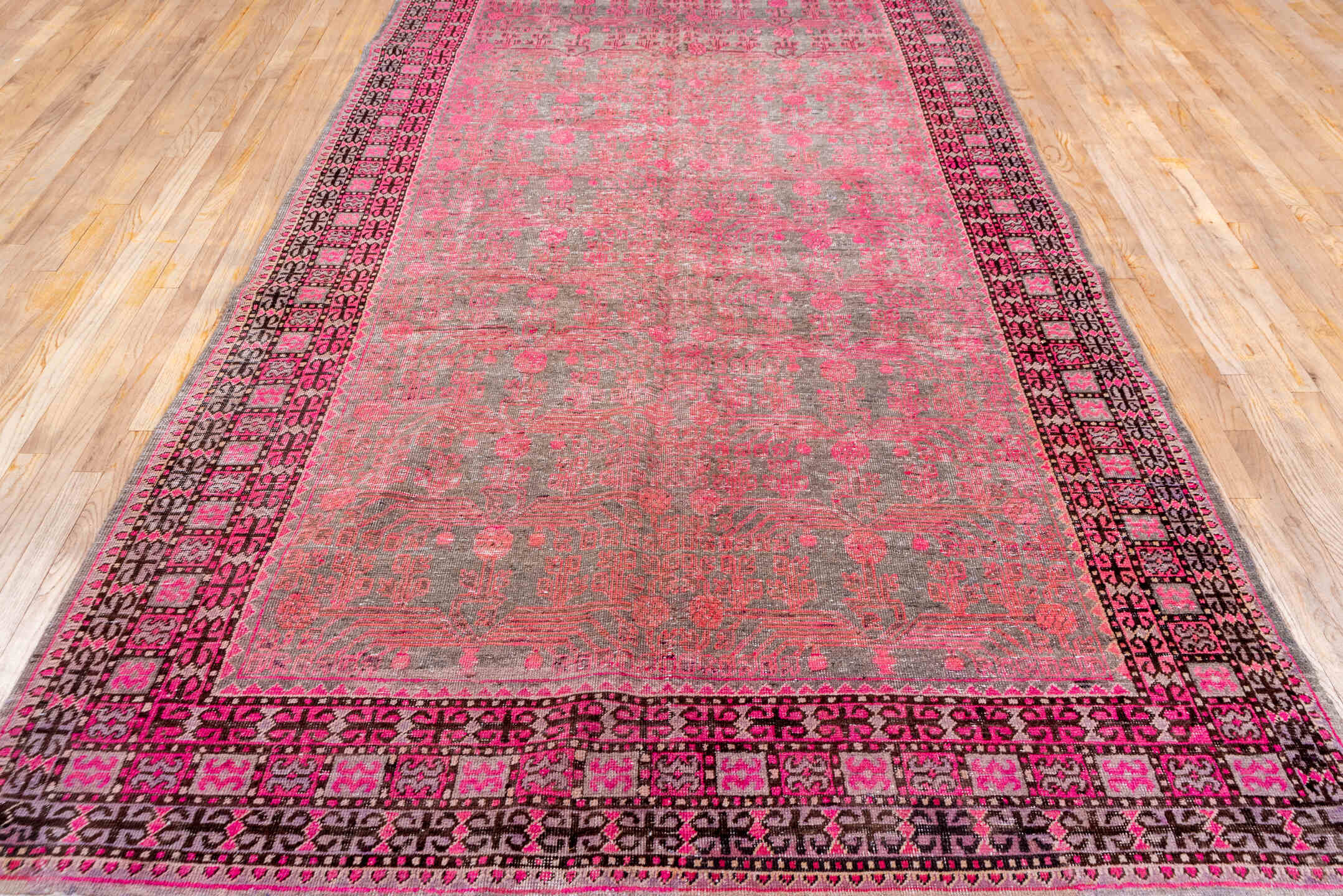 6' x 11' one-of-a-kind handmade antique Khotan large size rug. Color palette: rose, taupe, charcoal, pink, mauve, ivory, red