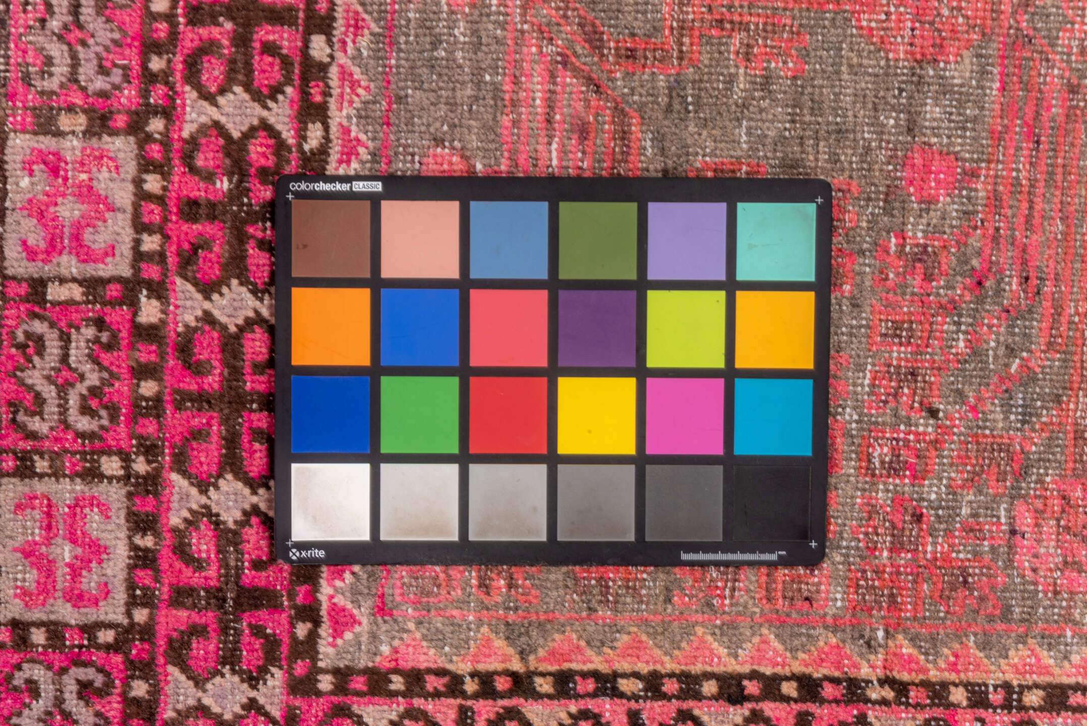 6' x 11' one-of-a-kind handmade vintage Khotan large size rug. Color palette: brown, gray, pink, red