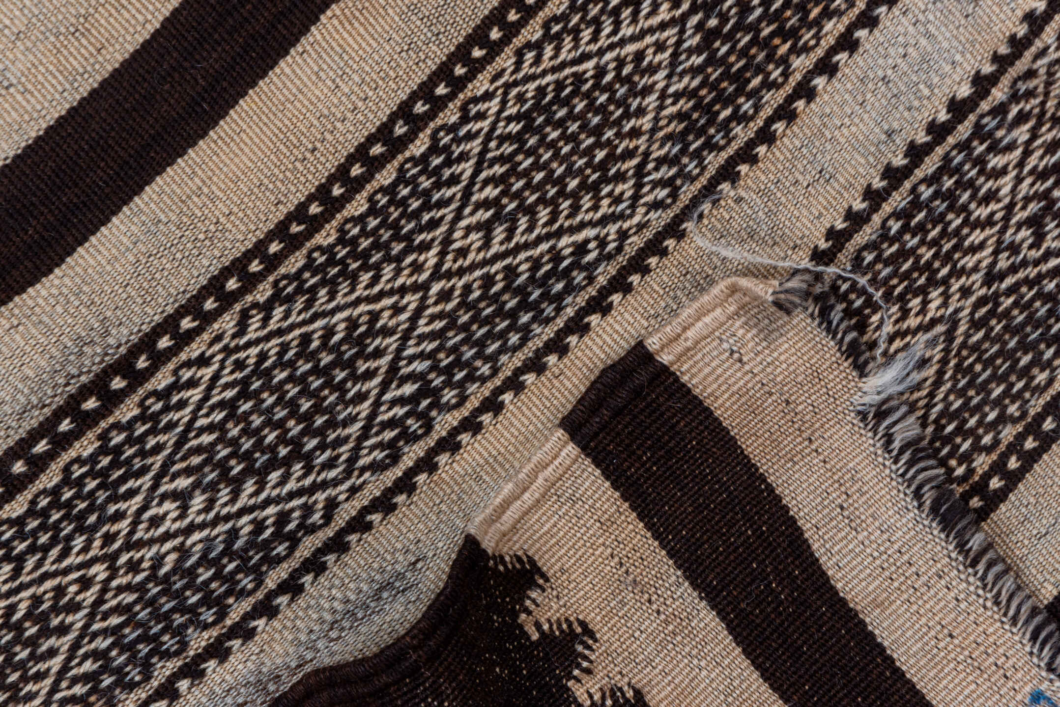 5' x 8' one-of-a-kind handmade vintage Kilim medium size rug. Color palette: brown, gray, off-white, pink, snow, white
