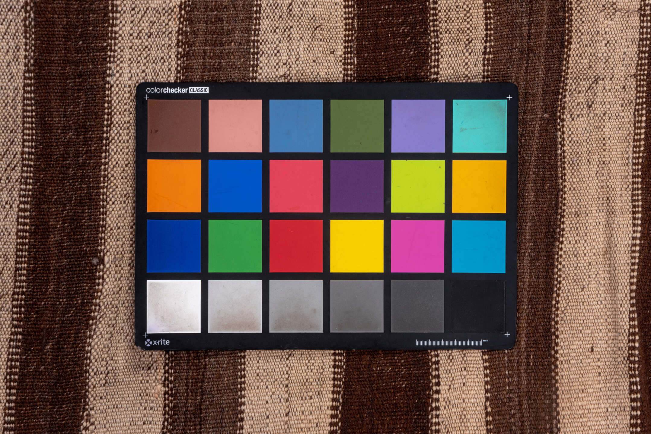 5' x 11' one-of-a-kind handmade vintage Kilim runner rug. Color palette: brown, gray, light gray, off-white, pink, redwood