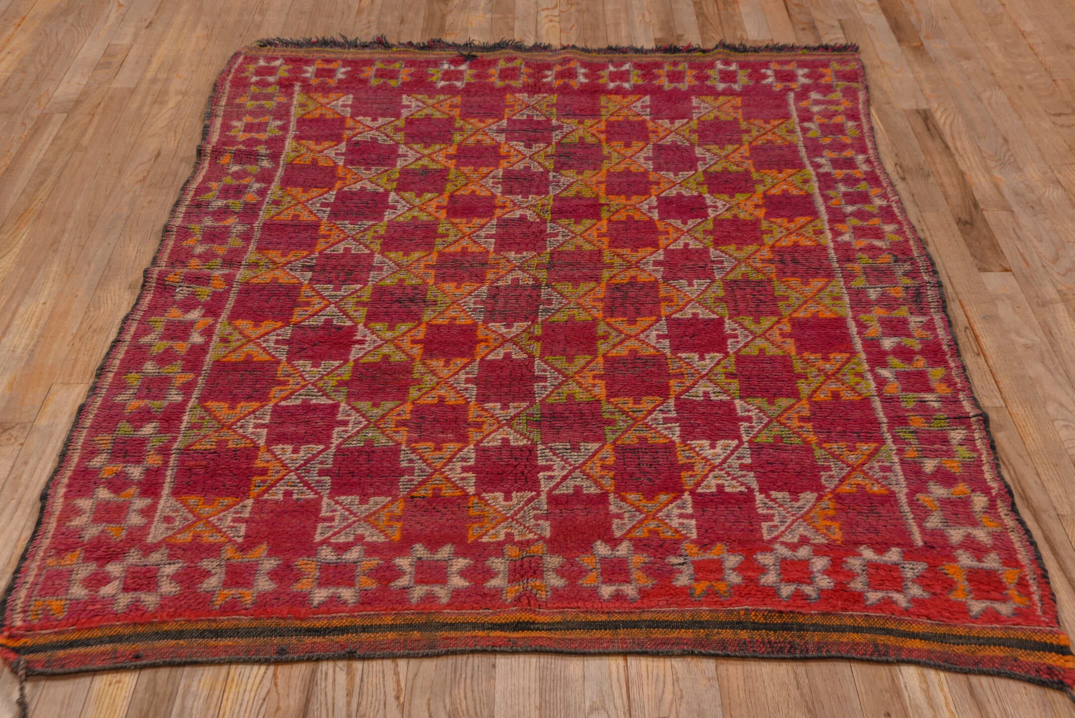 4' x 6' one-of-a-kind handmade vintage Moroccan small size rug. Color palette: rose, magenta, rust, ivory, saffron, brown