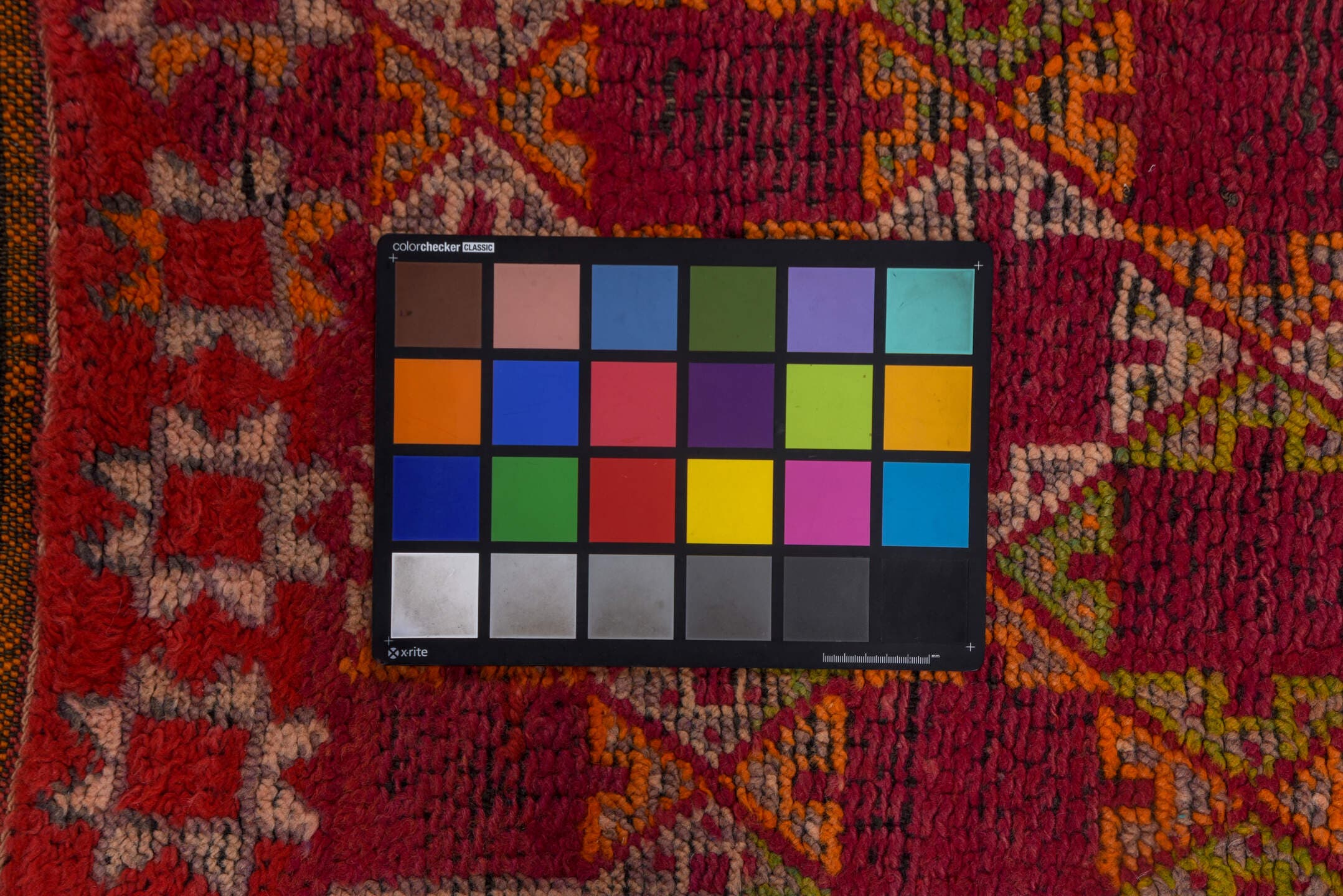 4' x 6' one-of-a-kind handmade vintage Moroccan small size rug. Color palette: rose, magenta, rust, ivory, saffron, brown