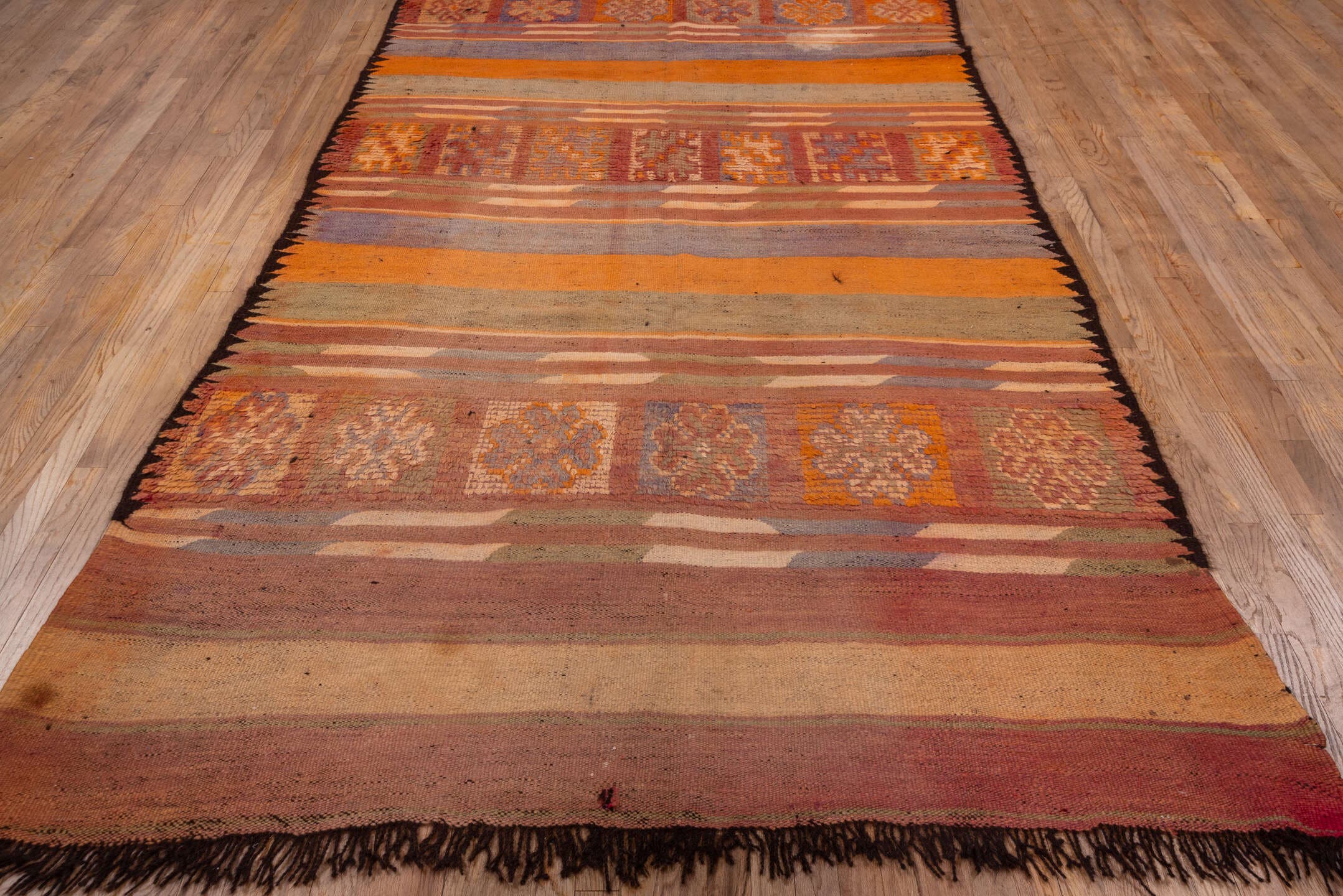 6' x 11' one-of-a-kind handmade vintage Moroccan large size rug. Color palette: terra cotta, rose, lavender, taupe, rust