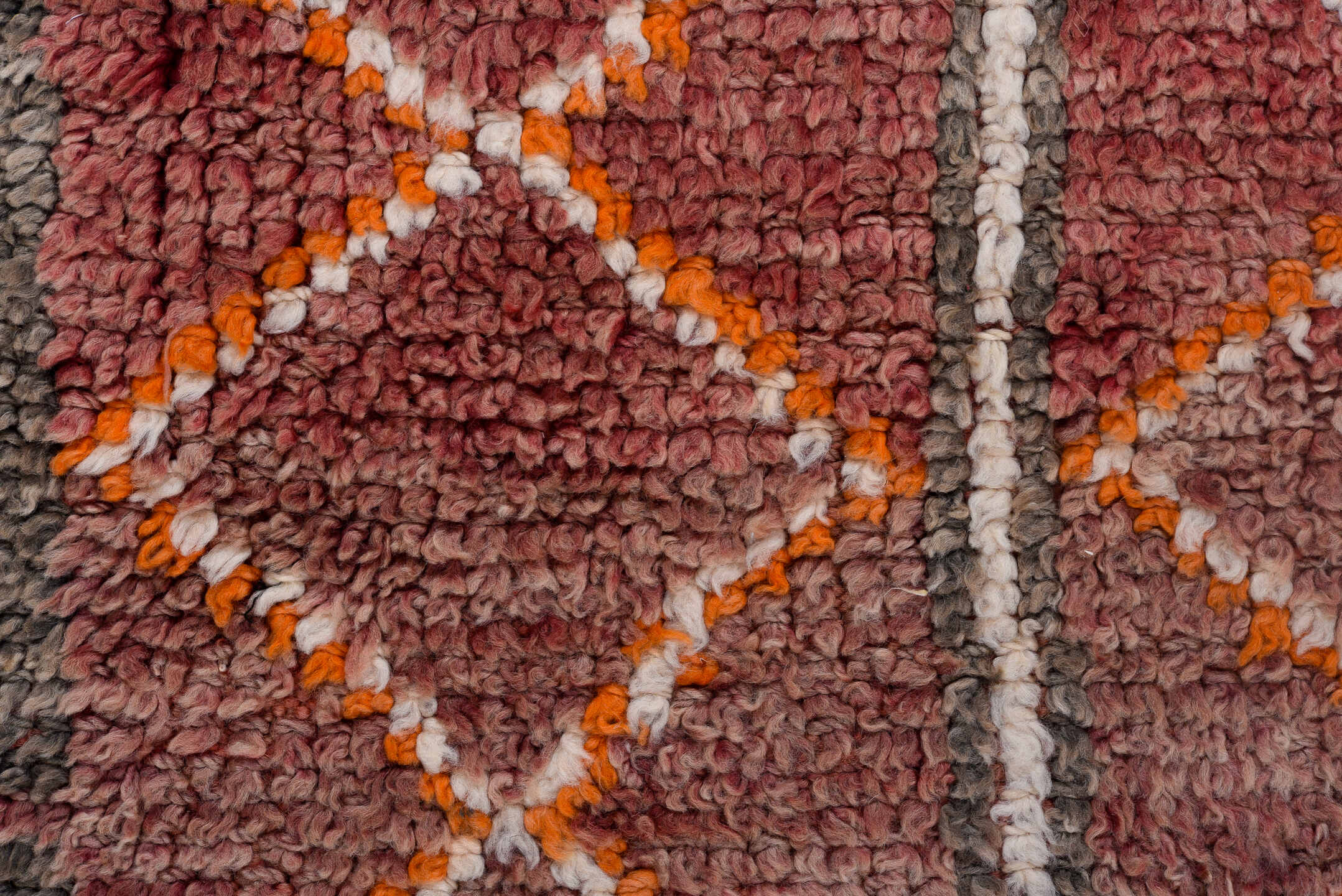 4' x 10' one-of-a-kind handmade vintage Moroccan runner rug. Color palette: rose, mauve, charcoal, ivory, saffron, taupe