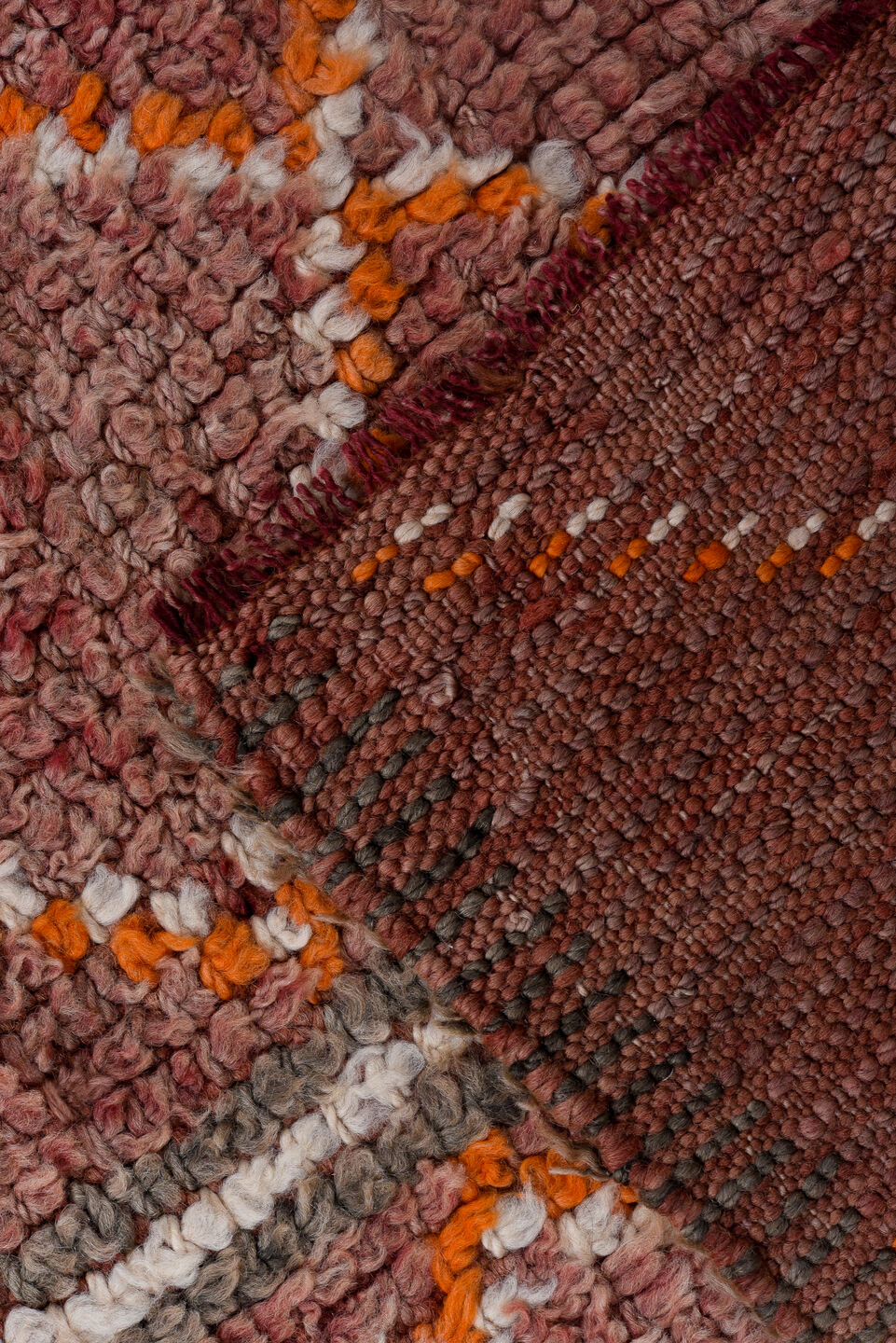 4' x 10' one-of-a-kind handmade vintage Moroccan runner rug. Color palette: pink, gray, brown, red, light gray, off-white