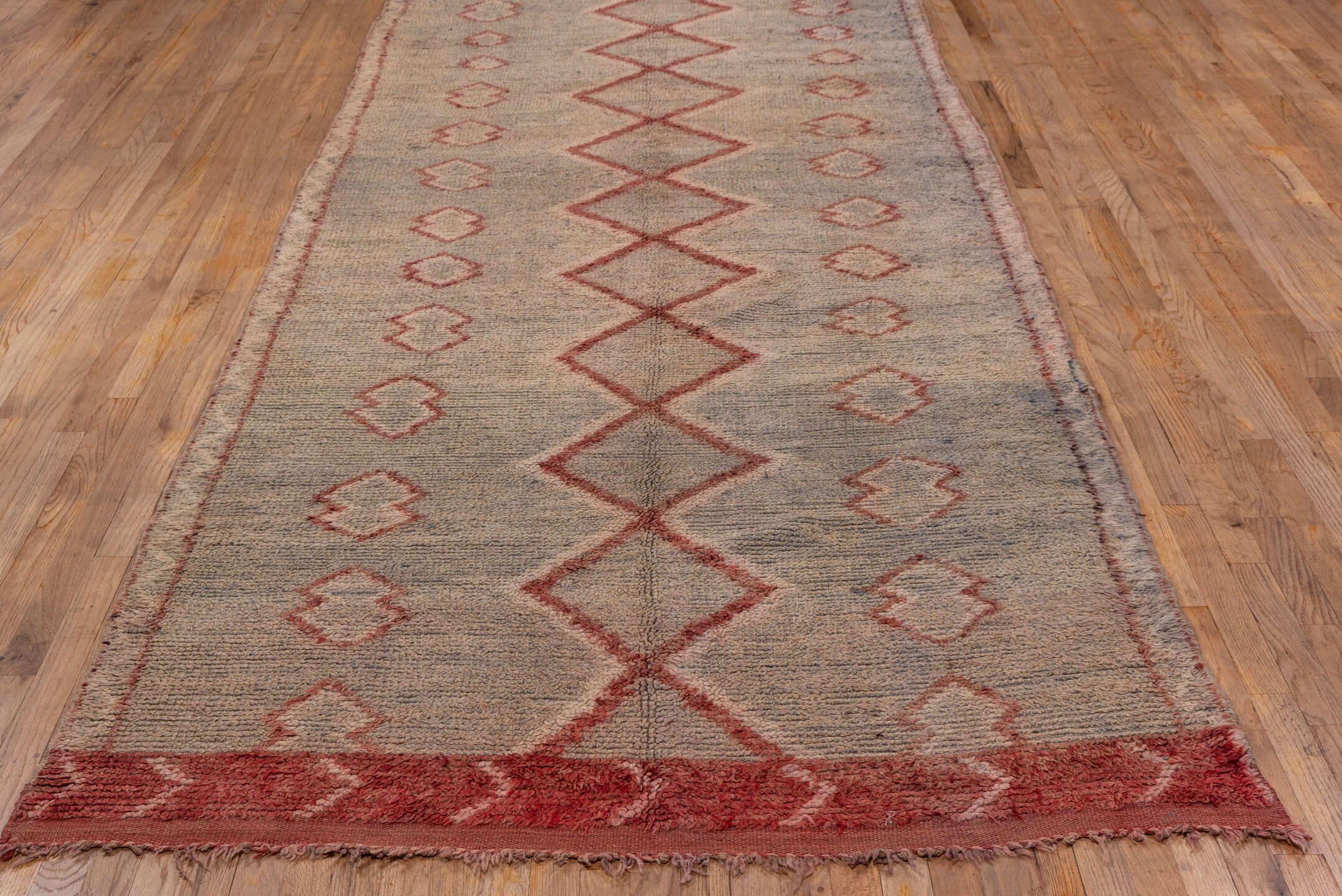 4' x 14' one-of-a-kind handmade vintage Moroccan runner rug. Color palette: brown, gray, off-white, pink, red, snow, white