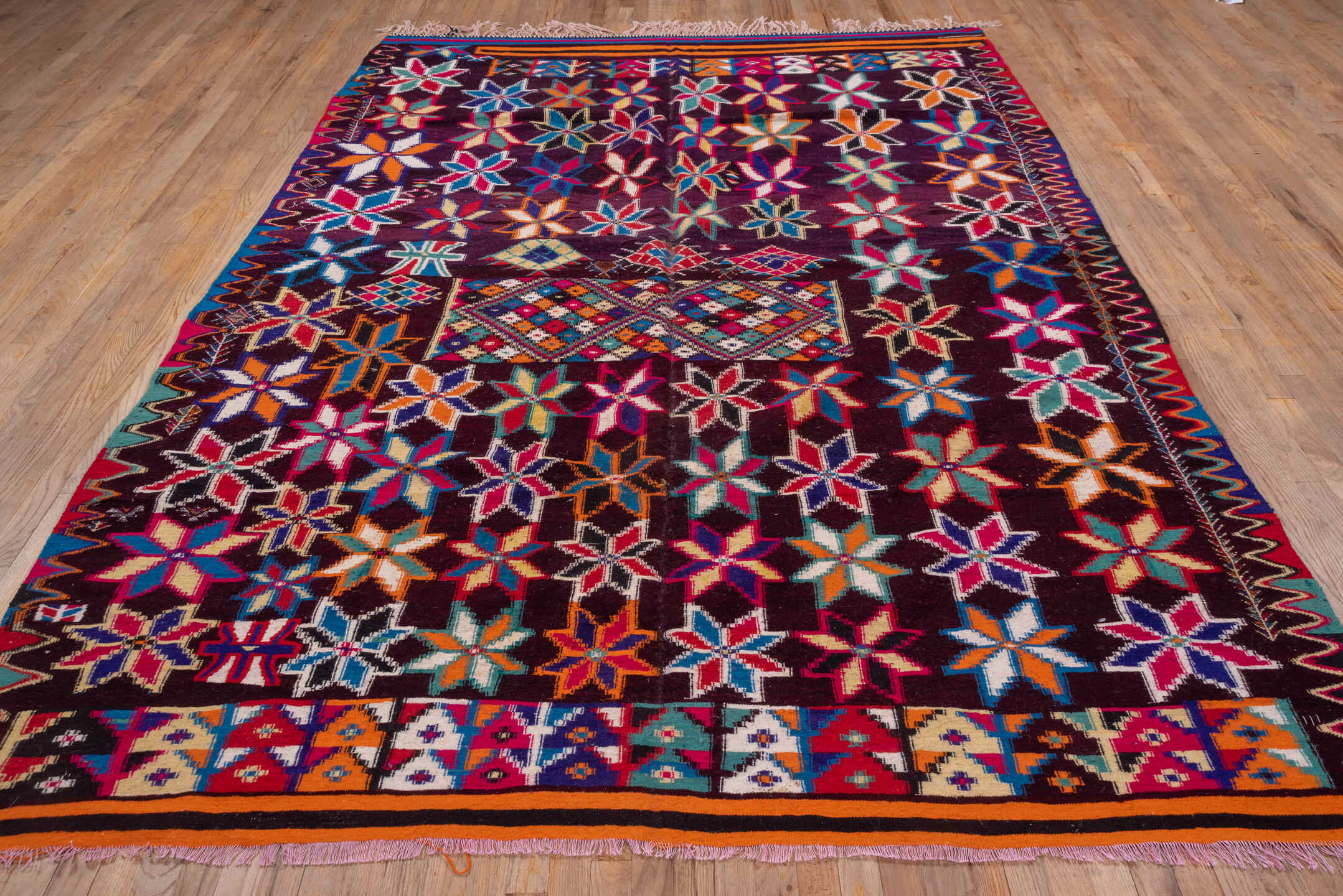 7' x 10' one-of-a-kind handmade vintage Kilim large size rug. Color palette: plum, crimson, orange, ivory, turquoise, cobalt