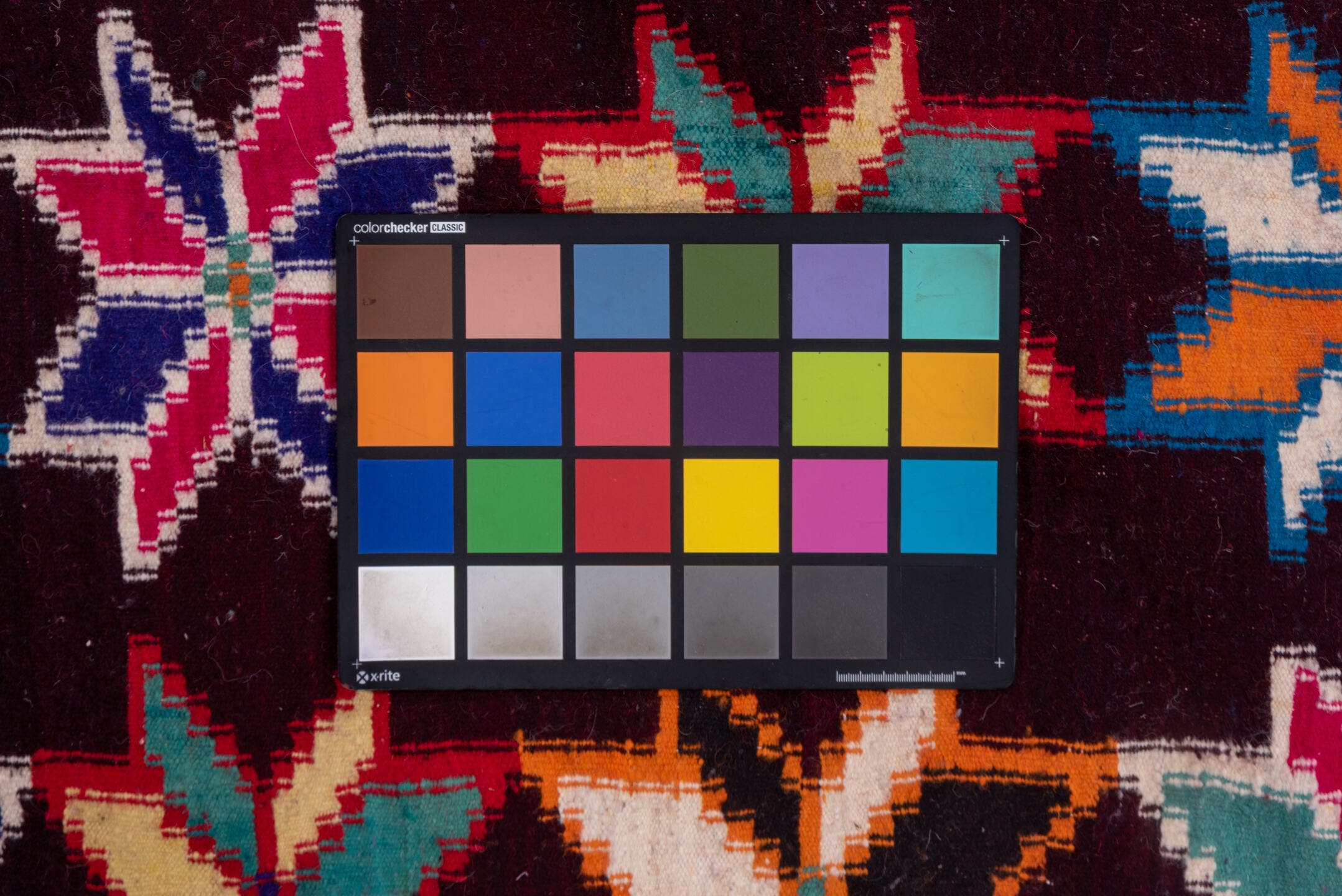 7' x 10' one-of-a-kind handmade vintage Kilim large size rug. Color palette: plum, crimson, orange, ivory, turquoise, cobalt