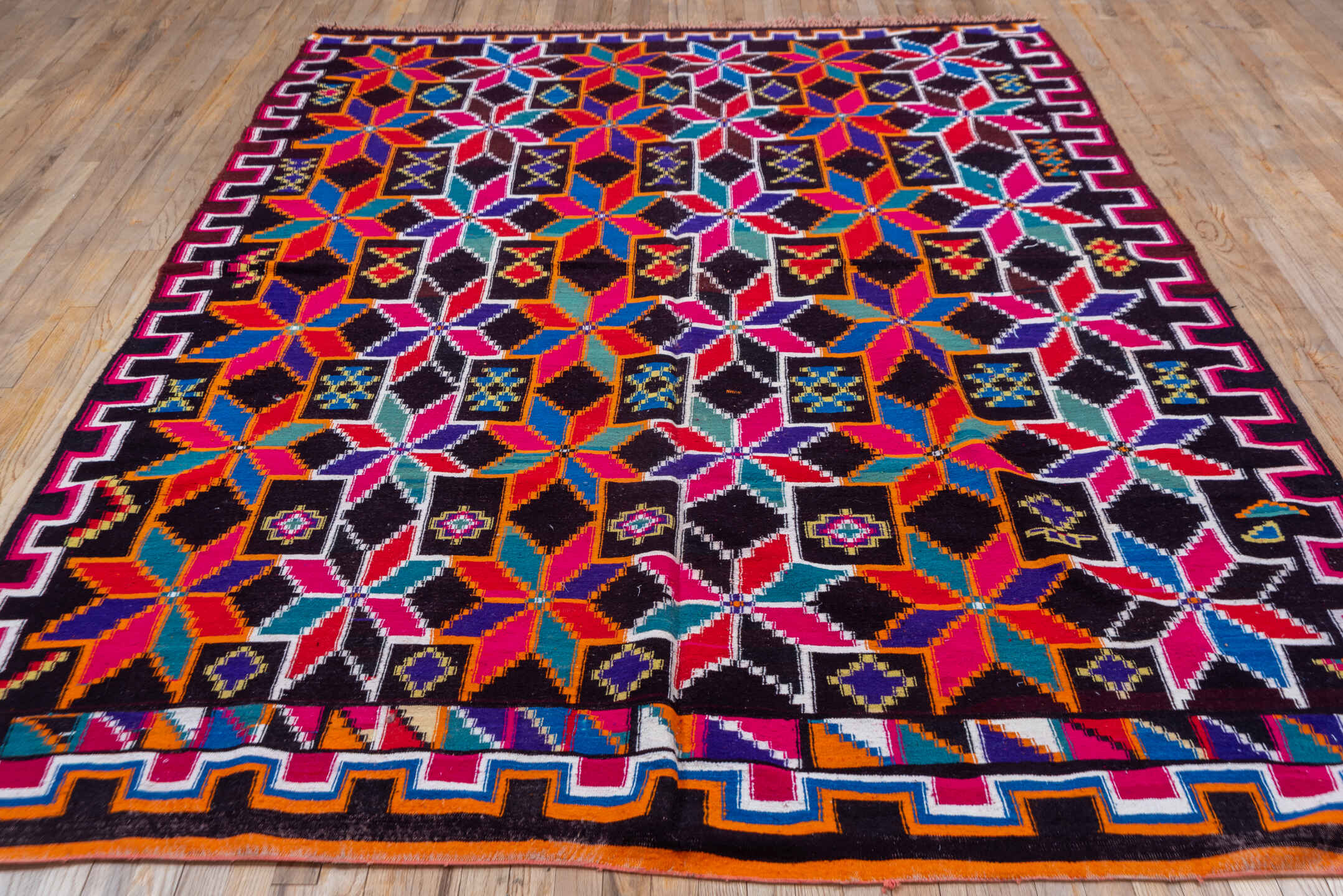 7' x 10' one-of-a-kind handmade vintage Kilim large size rug. Color palette: magenta, ebony, orange, ivory, cobalt