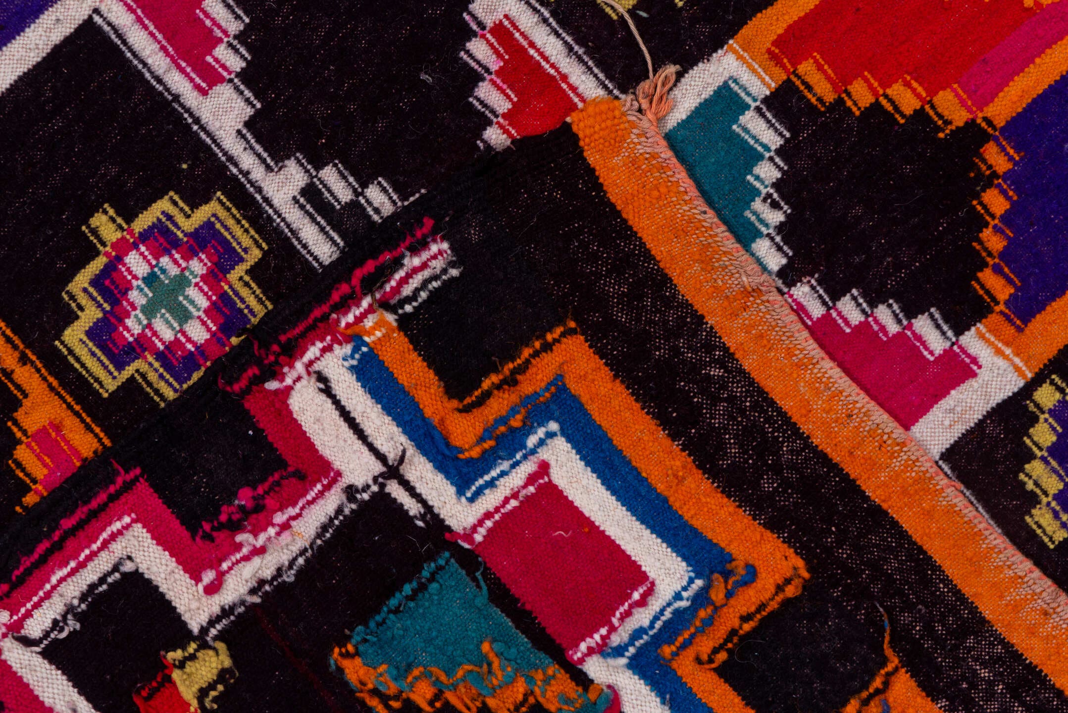 7' x 10' one-of-a-kind handmade vintage Kilim large size rug. Color palette: magenta, ebony, orange, ivory, cobalt