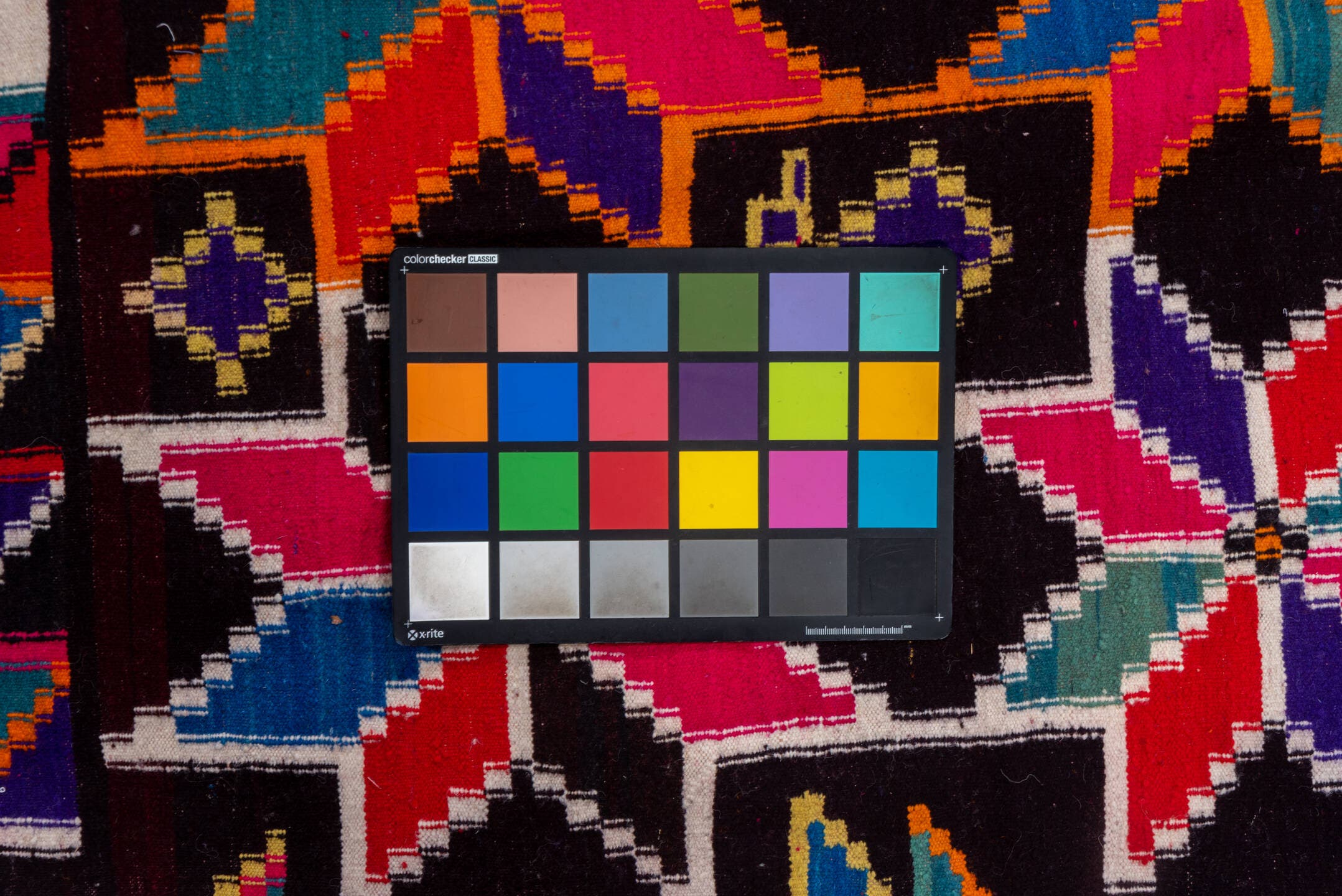 7' x 10' one-of-a-kind handmade vintage Kilim large size rug. Color palette: magenta, ebony, orange, ivory, cobalt