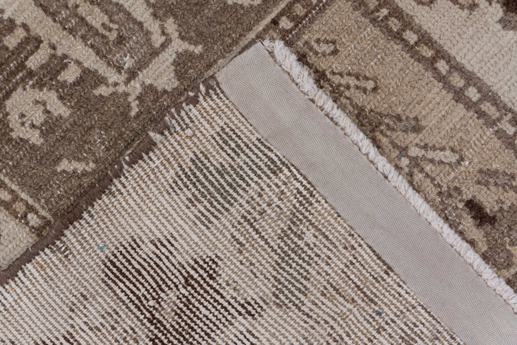 5' x 9' one-of-a-kind handmade antique Baktiary medium size rug. Color palette: taupe, brown, ivory, charcoal, camel, beige