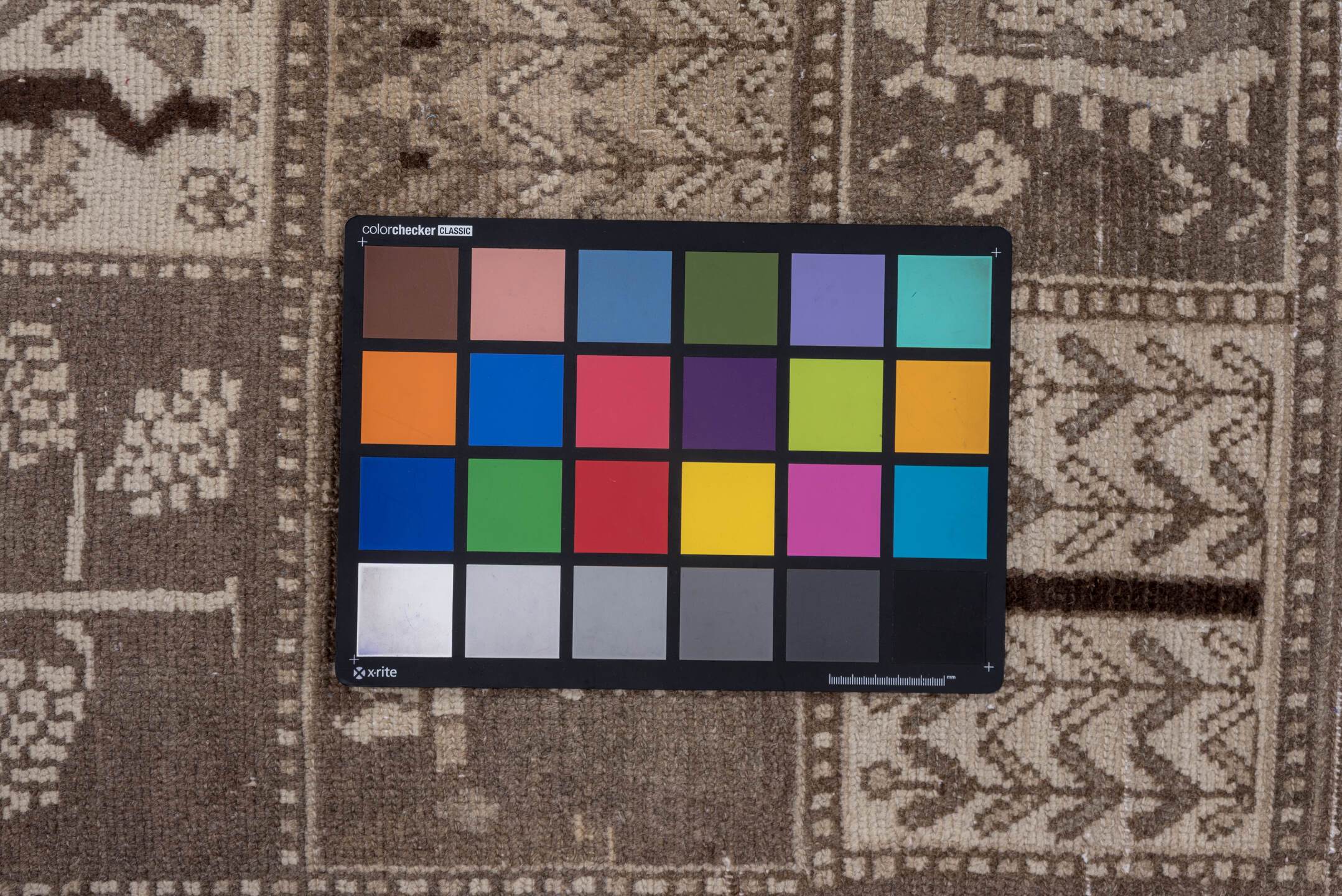 5' x 9' one-of-a-kind handmade vintage Baktiary medium size rug. Color palette: black, brown, charcoal, gray