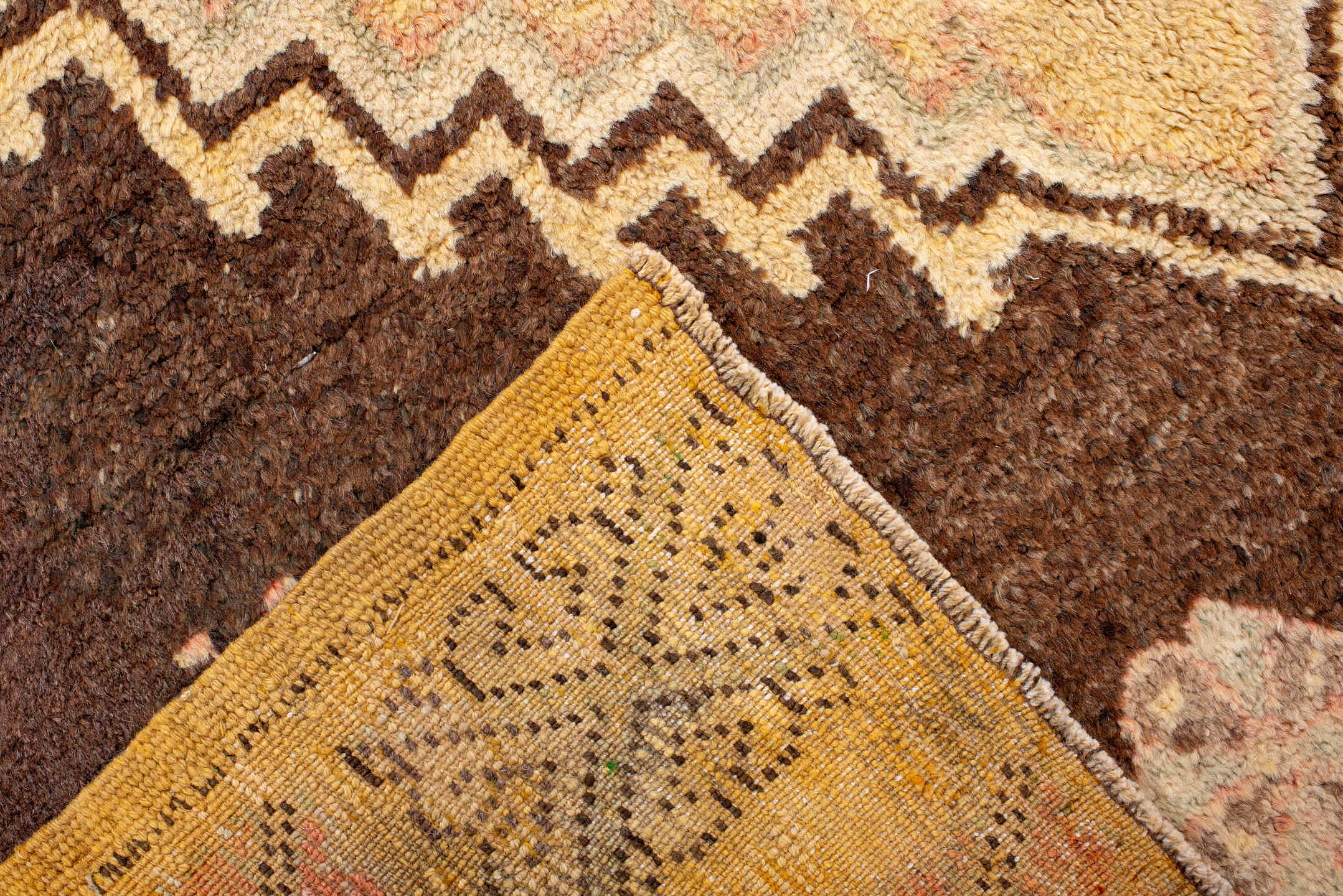 4' x 7' one-of-a-kind handmade vintage Moroccan rug. Color palette: brown, gold, camel, ivory, blush, charcoal, beige, pink