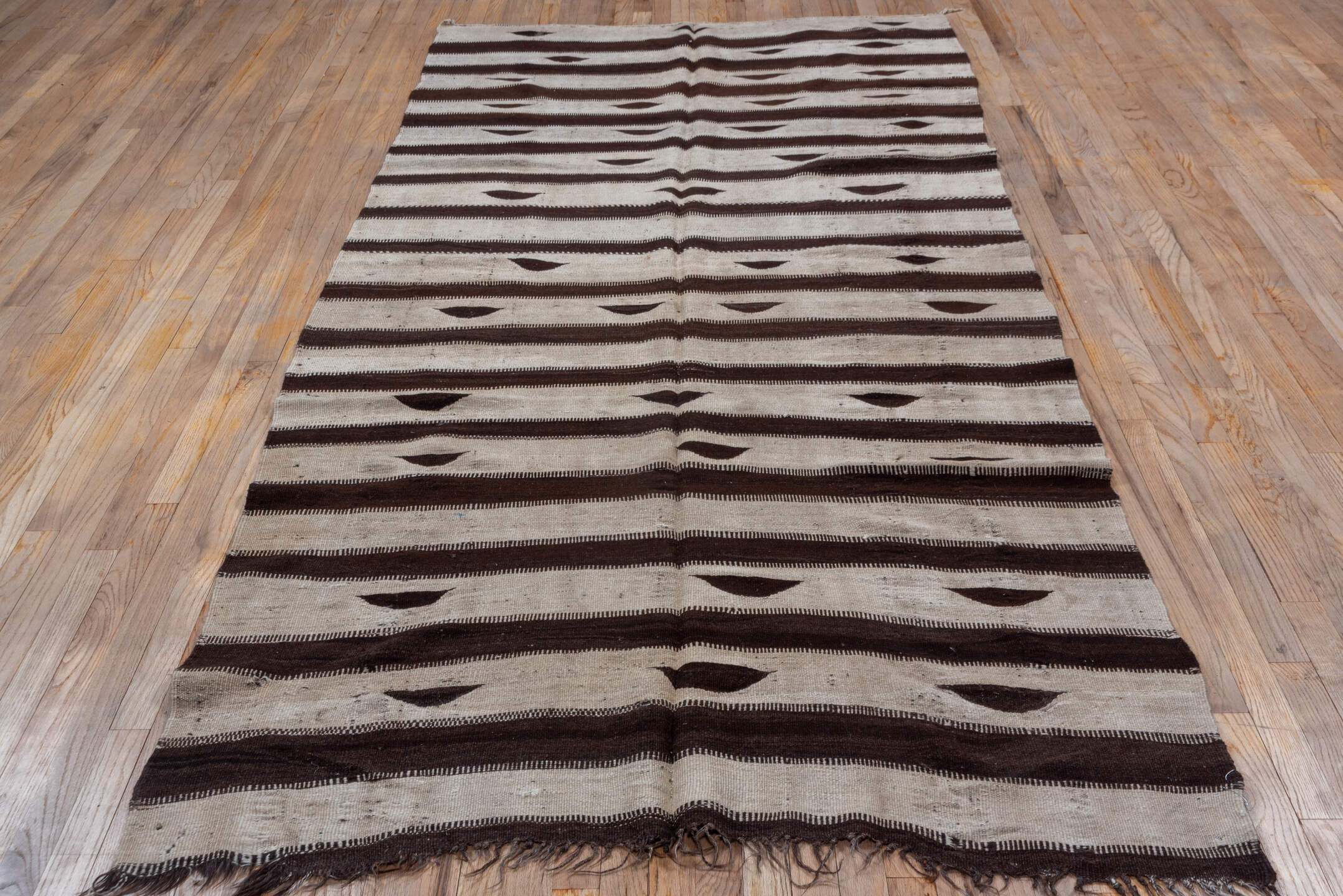 5' x 11' one-of-a-kind handmade vintage Kilim runner rug. Color palette: brown, gray, light gray, off-white, pink, snow