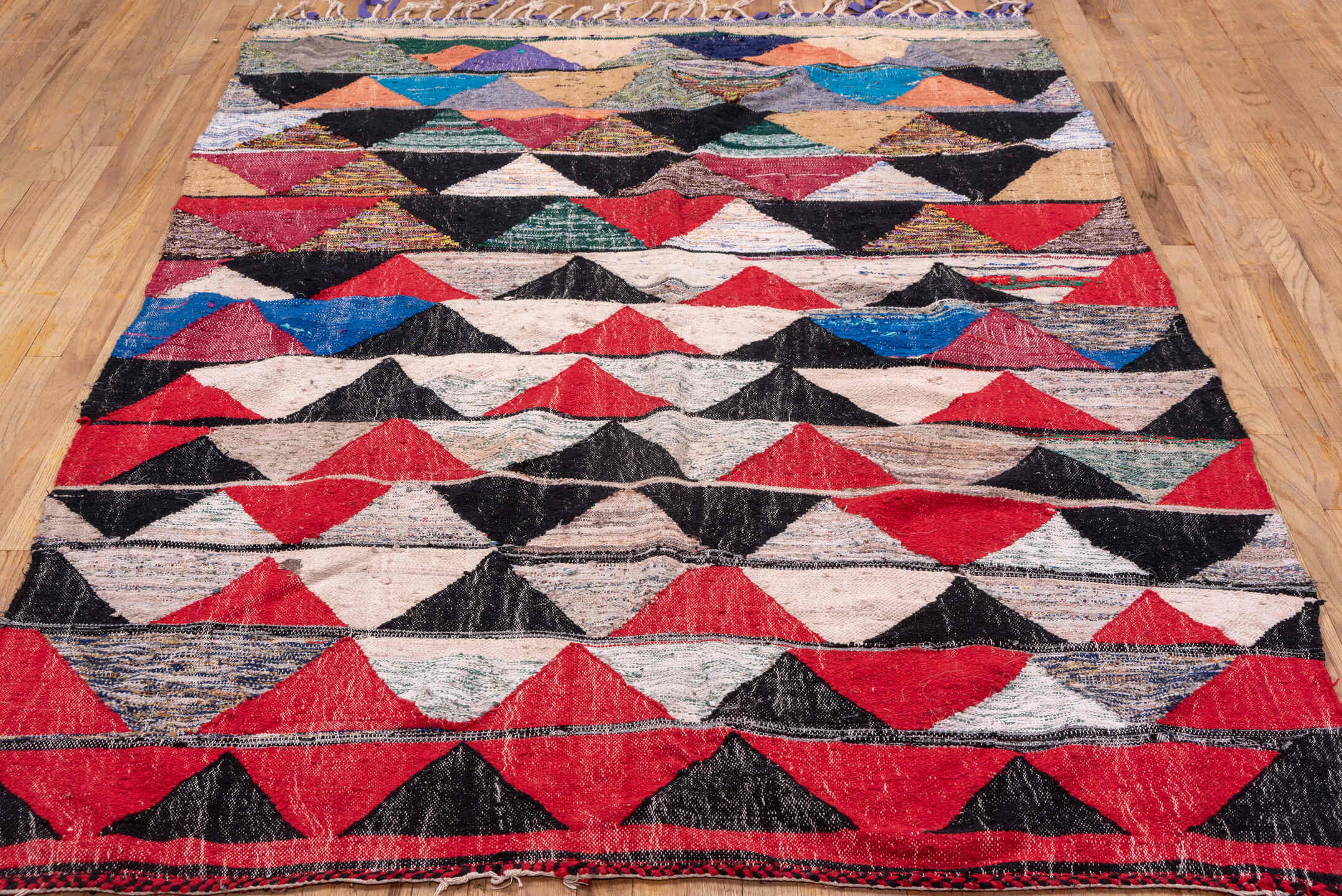 5' x 8' one-of-a-kind handmade vintage Rag Rug medium size rug. Color palette: crimson, ivory, black, blush, cobalt, taupe