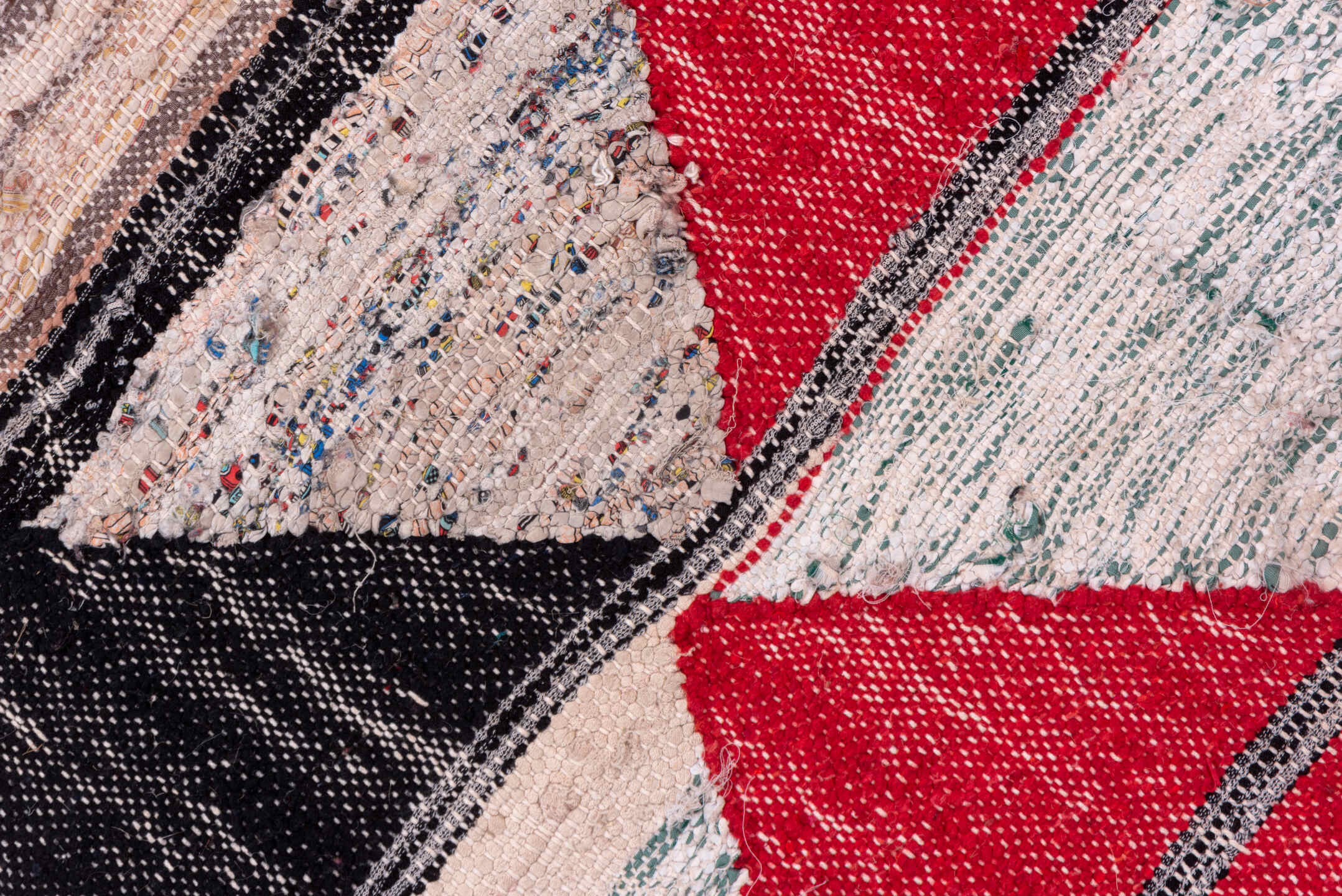 5' x 8' one-of-a-kind handmade vintage Rag Rug medium size rug. Color palette: crimson, ivory, black, blush, cobalt, taupe