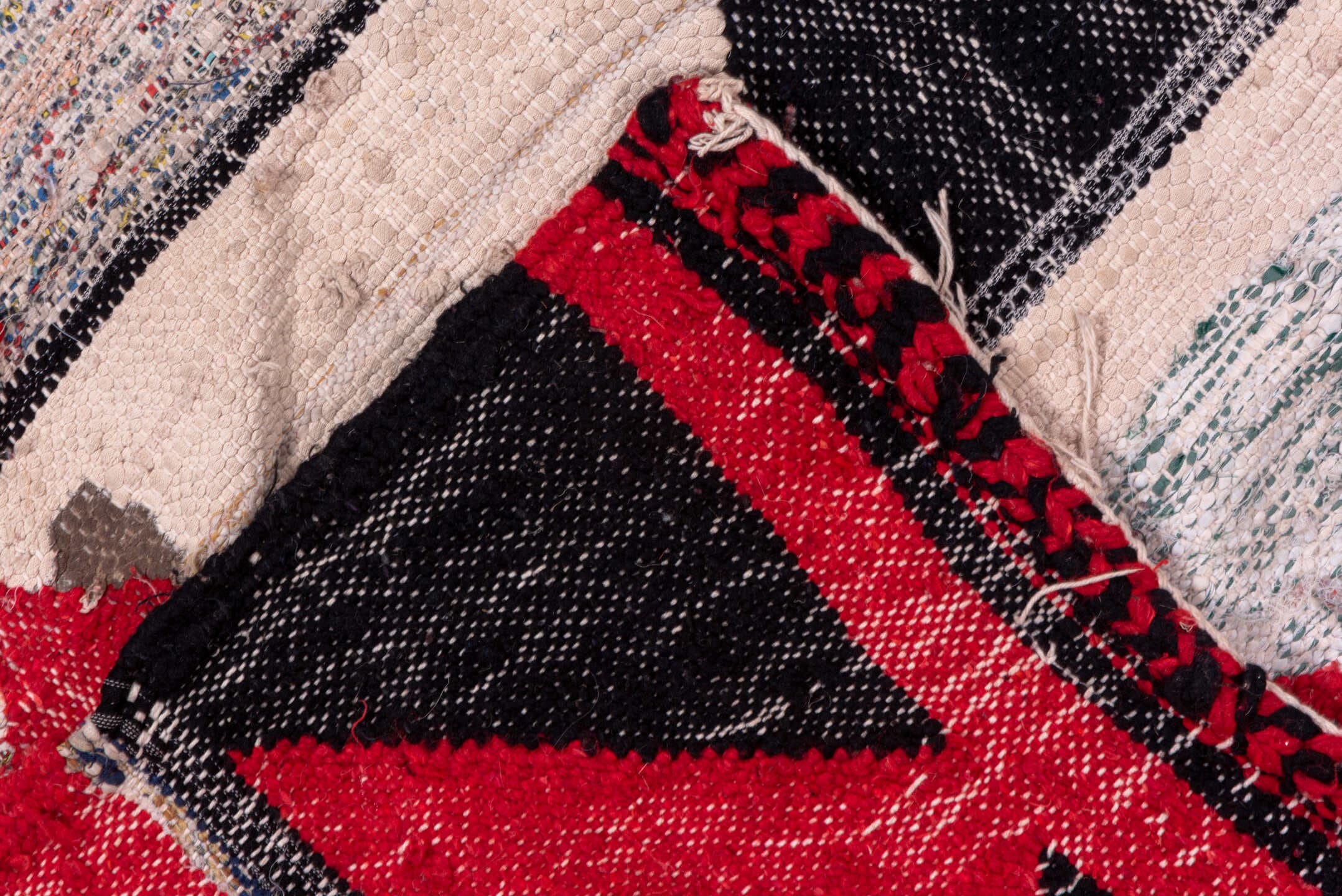 5' x 8' one-of-a-kind handmade vintage Rag Rug medium size rug. Color palette: crimson, ivory, black, blush, cobalt, taupe