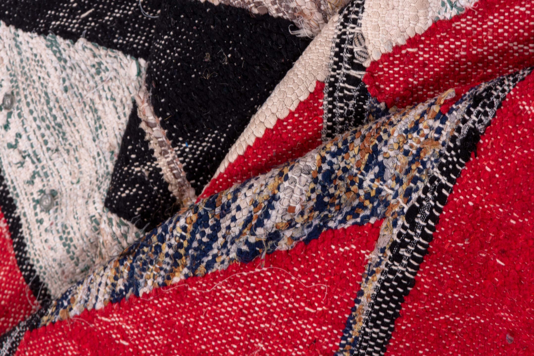5' x 8' one-of-a-kind handmade vintage Rag Rug medium size rug. Color palette: crimson, ivory, black, blush, cobalt, taupe