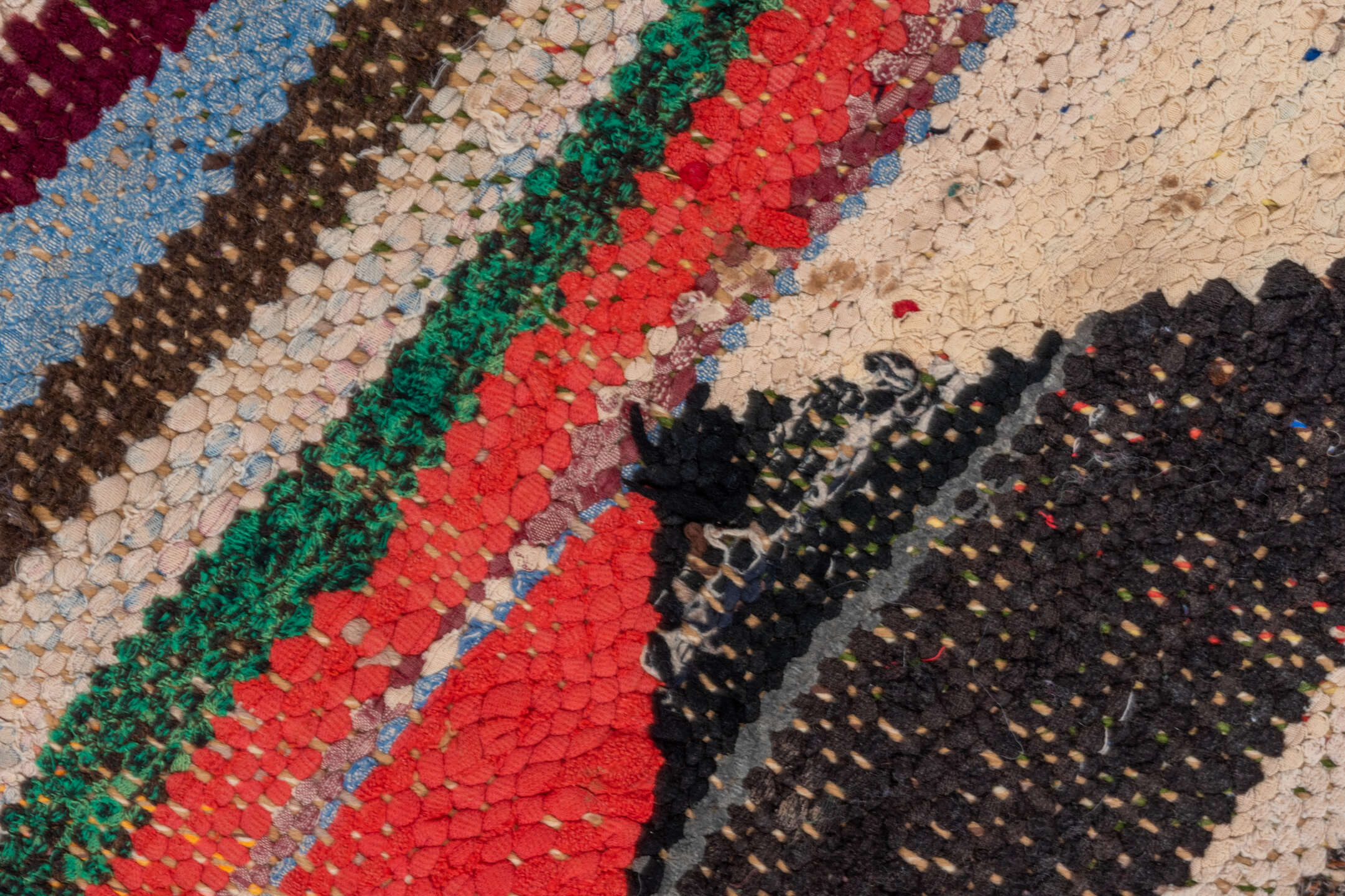 4' x 5' one-of-a-kind handmade vintage Rag Rug small size rug. Color palette: black, blue, brown, cadet blue, dark cyan