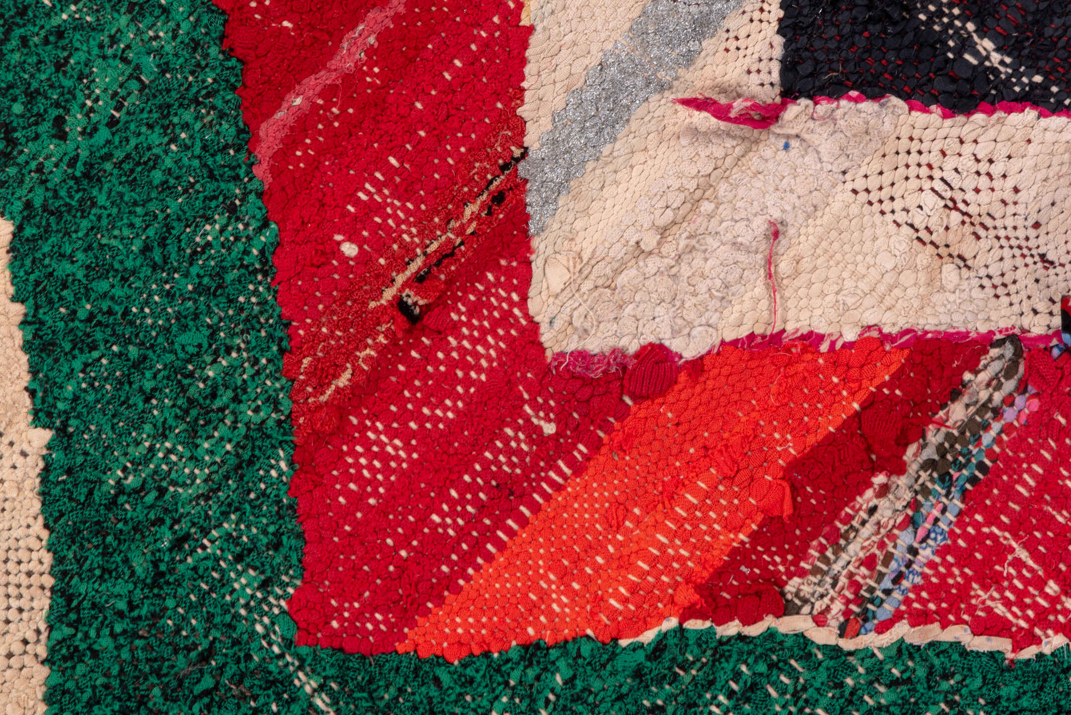 4' x 6' one-of-a-kind handmade vintage Rag Rug small size rug. Color palette: ivory, blue, charcoal, sky_blue, green, red