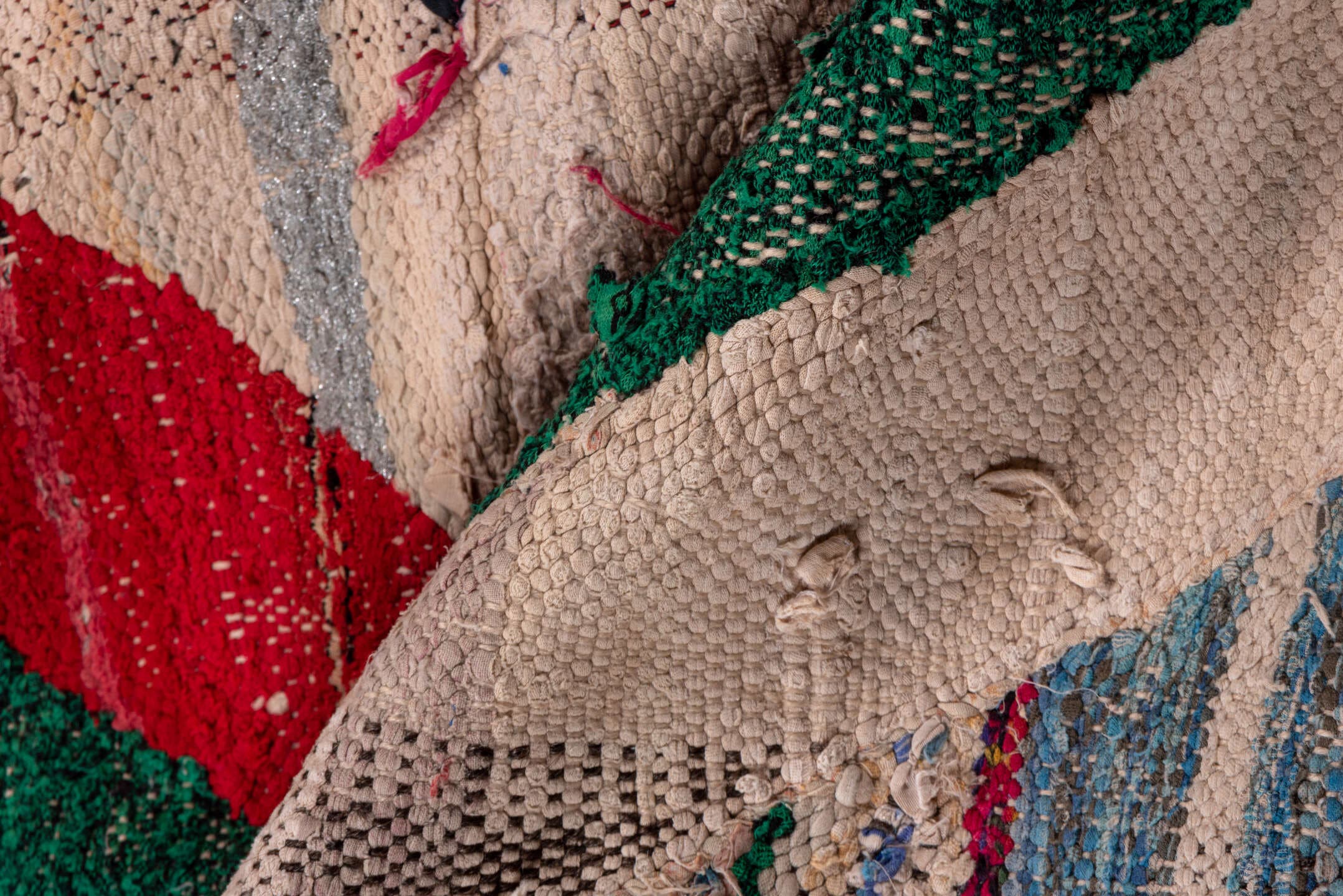 4' x 6' one-of-a-kind handmade vintage Rag Rug small size rug. Color palette: ivory, blue, charcoal, sky_blue, green, red