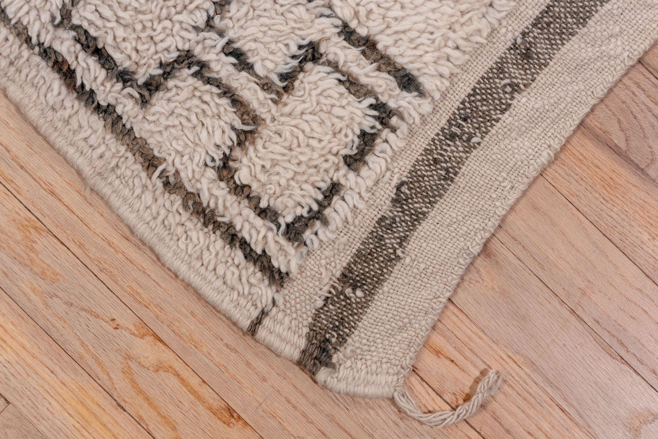 6' x 10' one-of-a-kind handmade vintage Moroccan large size rug. Color palette: antiquewhite, black, brown, charcoal