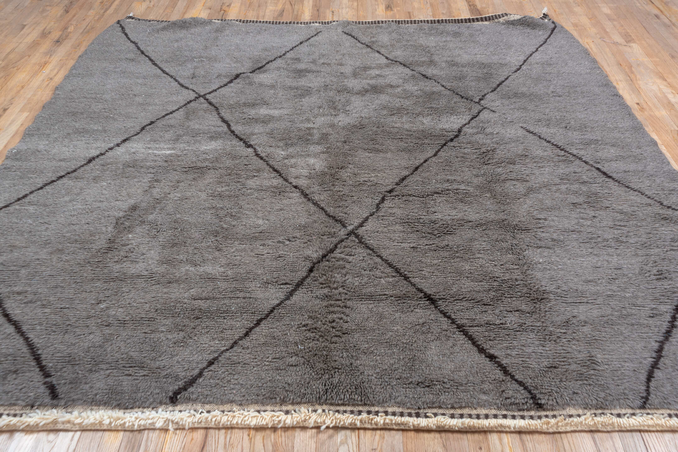 9' x 9' one-of-a-kind handmade vintage Moroccan rug. Color palette: taupe, charcoal, ivory, beige, gray, black