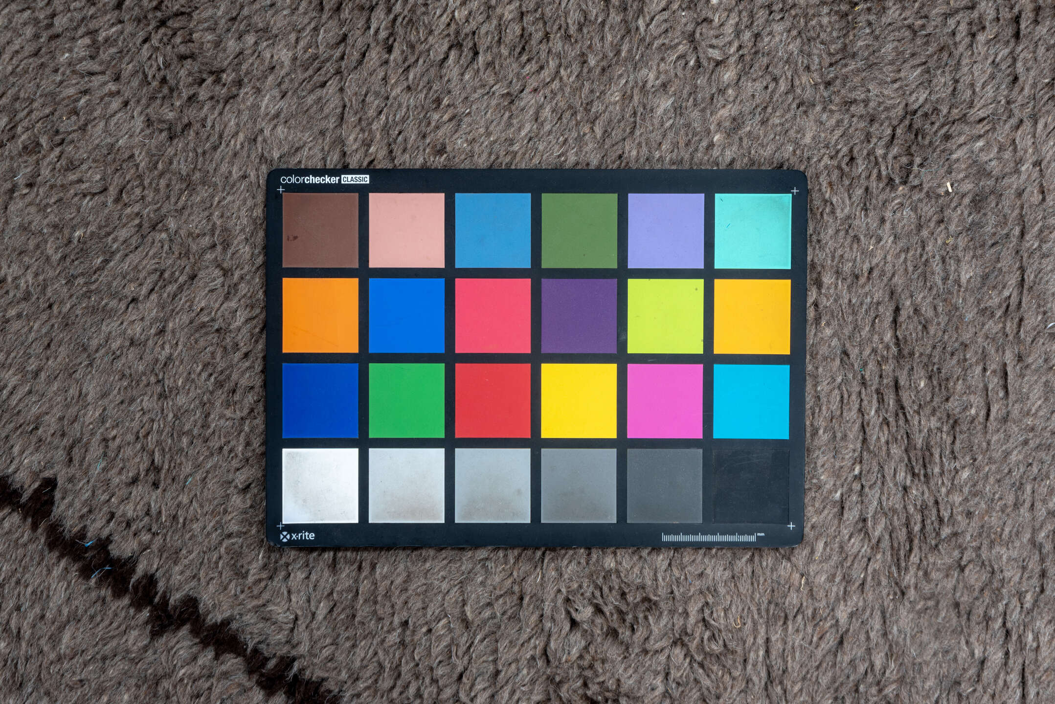 9' x 9' one-of-a-kind handmade vintage Moroccan rug. Color palette: taupe, charcoal, ivory, beige, gray, black