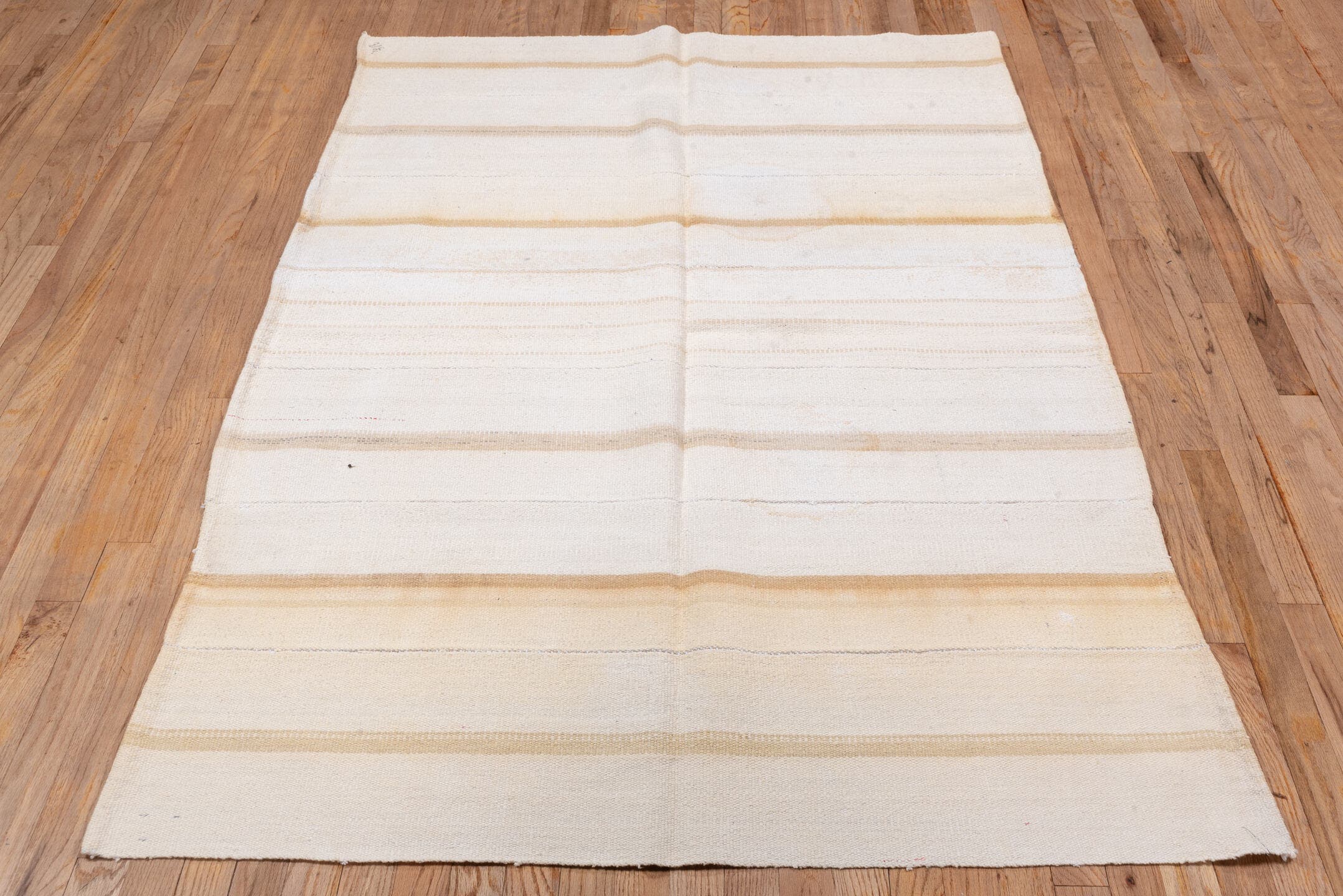 4' x 6' one-of-a-kind handmade vintage Flatweave small size rug. Color palette: ivory, cream, beige, camel