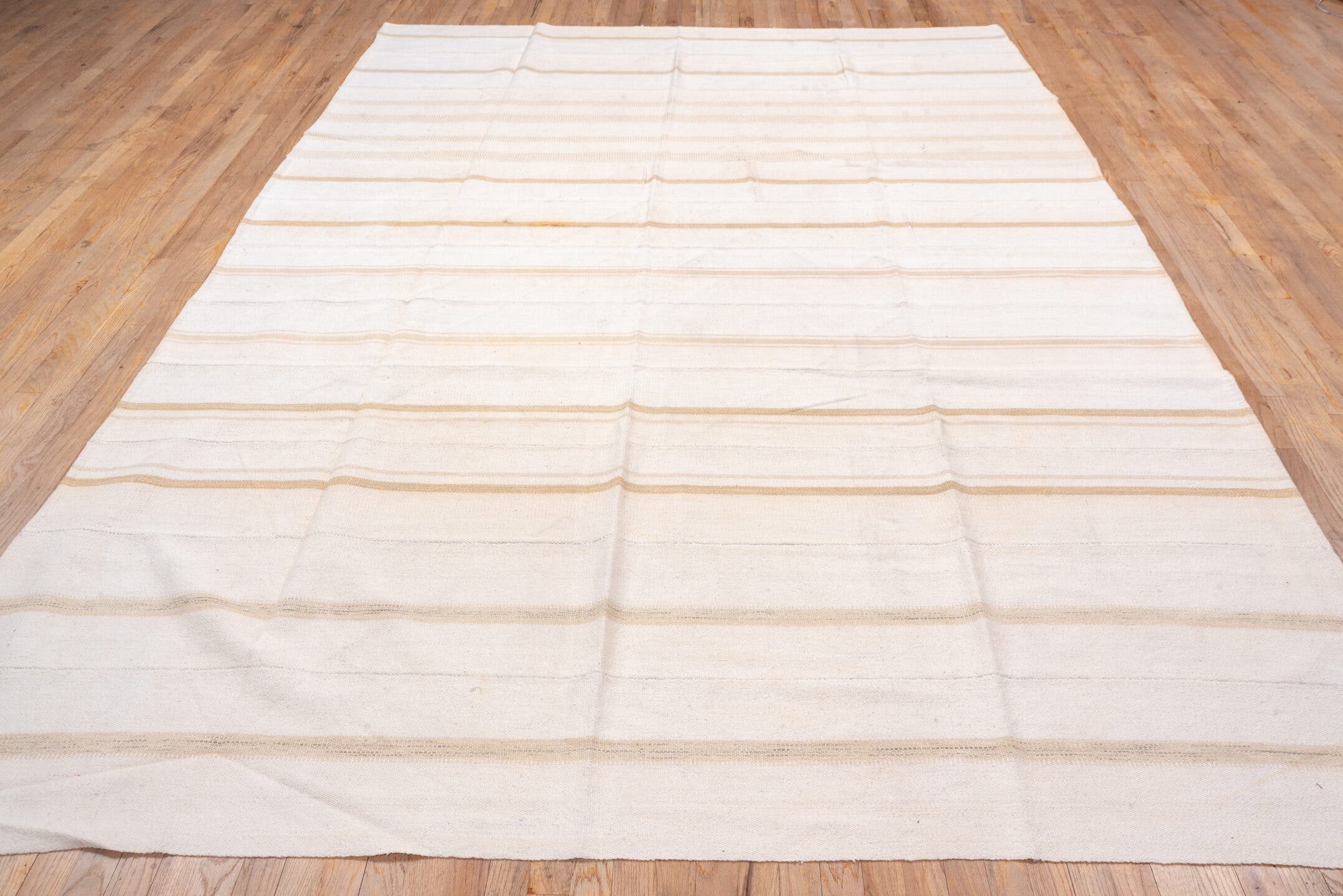 7' x 11' one-of-a-kind handmade vintage Flatweave large size rug. Color palette: ivory, beige, camel, cream